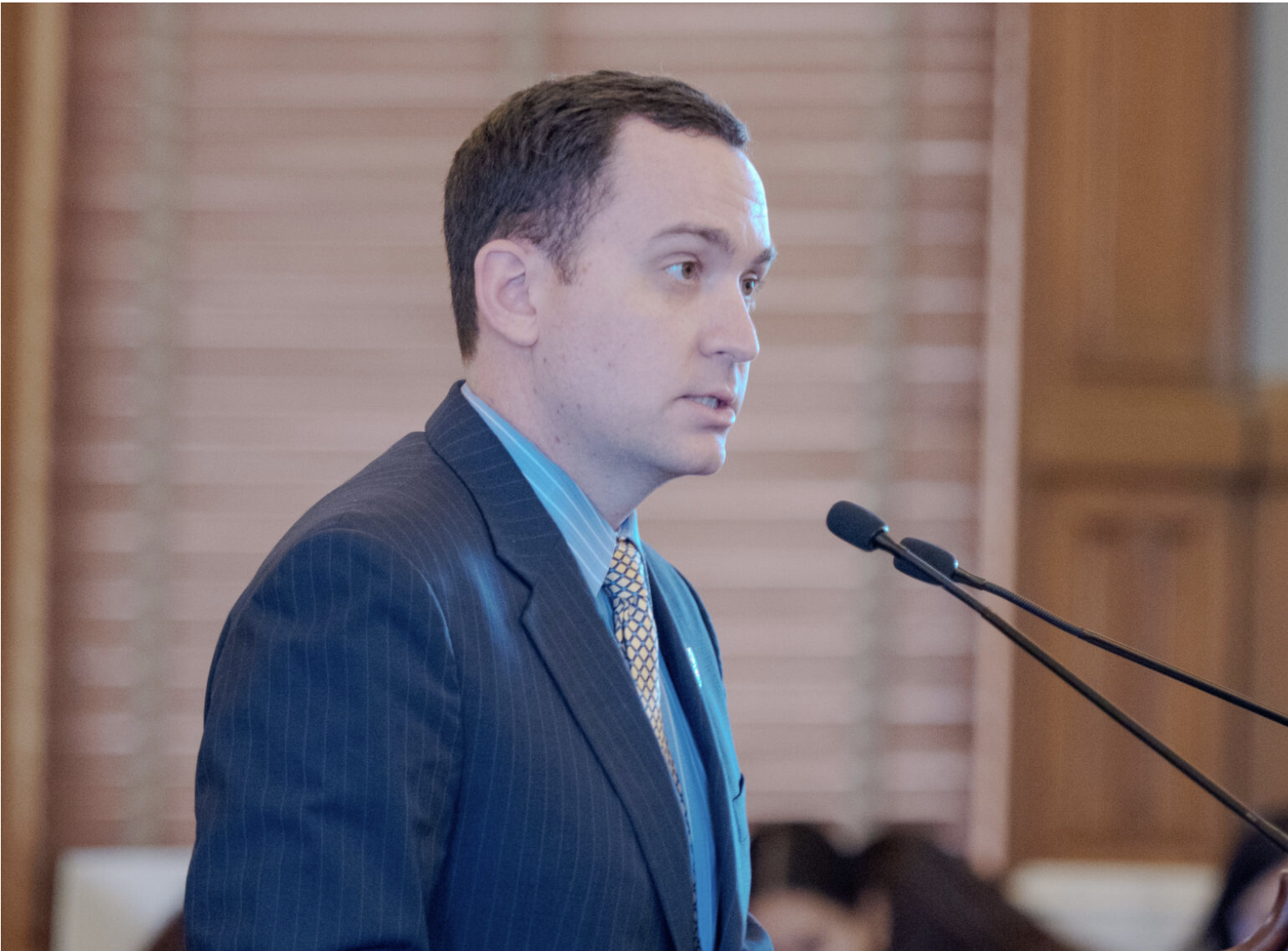 Rep. Blake Carpenter, R-Derby, assails Gov. Laura Kelly for vetoing the legislative branch's budget before the Kansas Legislature votes to override the governor's rejection of that piece of the appropriations bill. Kelly sought to persuade the Legislature to improve upon a 1% raise given thousands of state employees in wake of the Legislature's 4.4% pay bump. (Photo by Sherman Smith/Kansas Reflector)