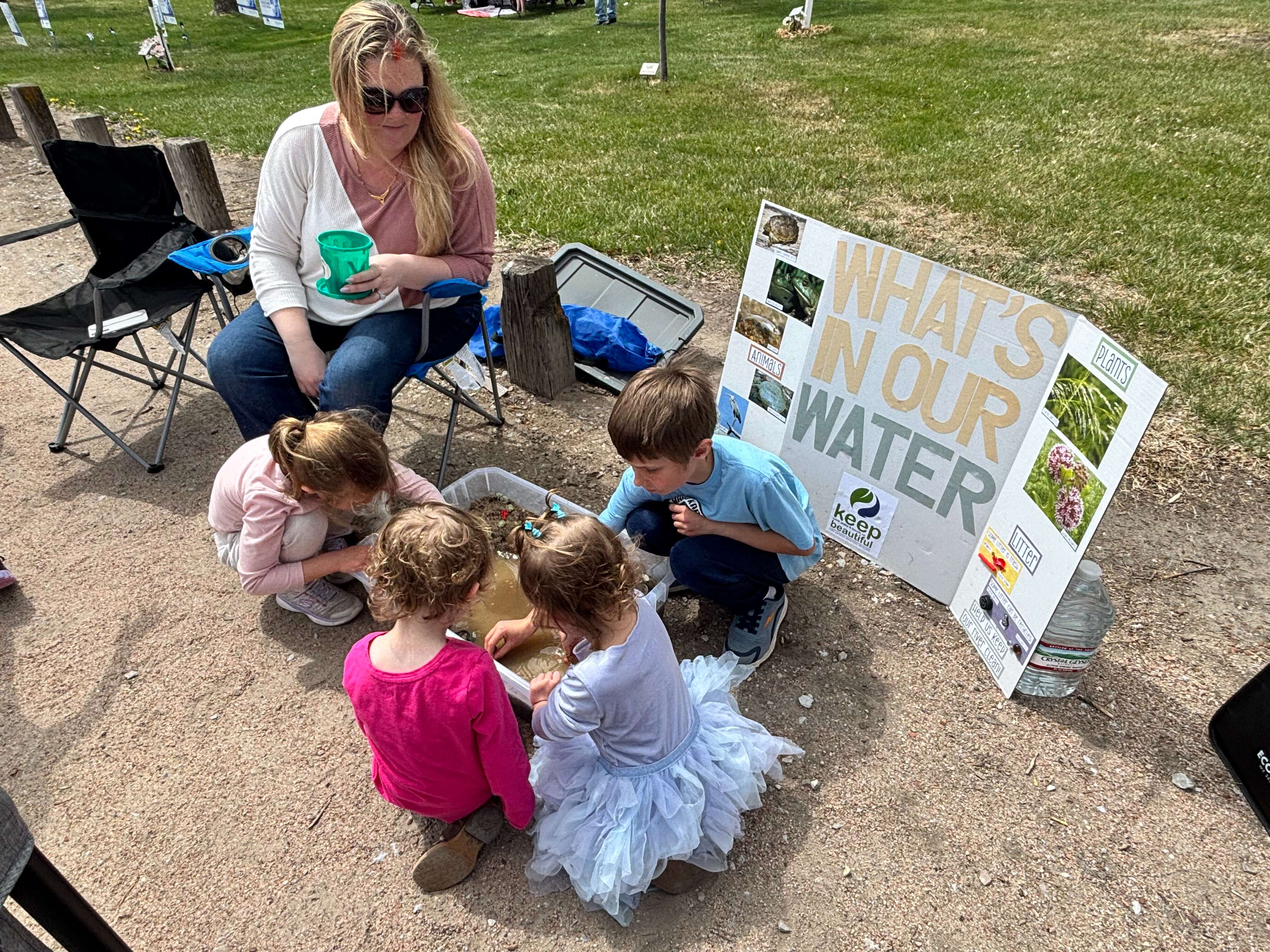 Children participate in an interactive learning activity hosted by Keep North Platte and Lincoln County Beautiful during Kids in the Park. (The Post)