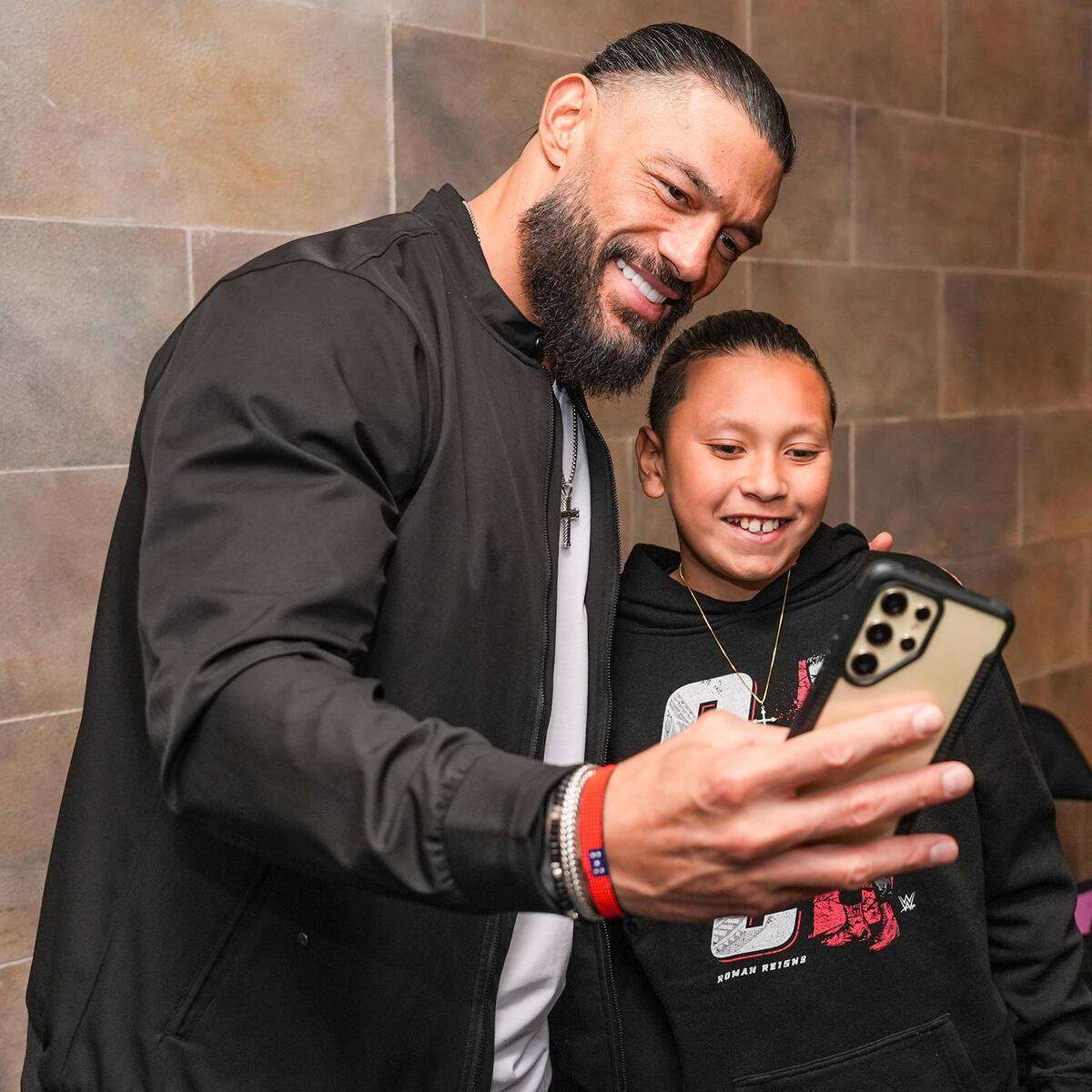 Roman Reigns (L) with Javion Crable (Photo courtesy Jamar Crable)