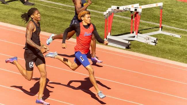 Da'Shawn Lester wins the 400 meters, one of seven Blue Dragon athletes to win events on Saturday at the Tabor College Invitational in Hillsoboro. (Sydney Holzrichter/Blue Dragon Sports Information).