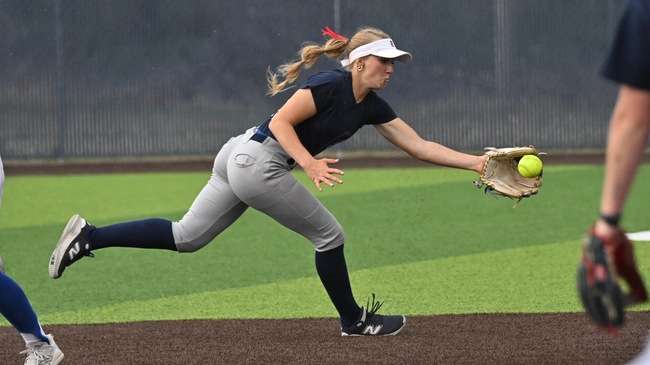 Blue Dragon shortstop Riley Dreher ranges up the middle to field the ball and get a force at second base in Hutchinson's 3-0 win over Barton on Saturday at Fun Valley. (Andrew Carpenter/Digital Fox Photography).