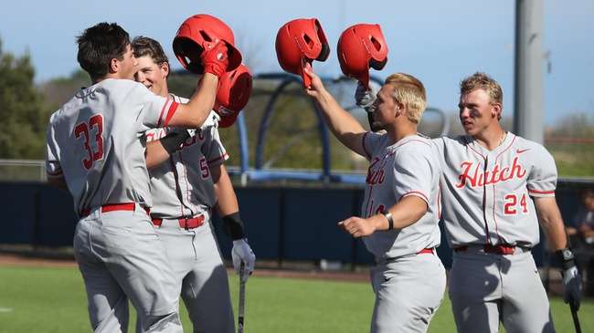Blue Dragon teammates congratulate Anthony Mazza after a home run in Game 1 of a doubleheader sweep of the Barton Cougars on Saturday in Great Bend. (Photo courtesy Todd Moore/Barton Sports Information)
