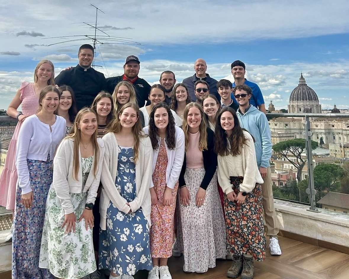 The group on the rooftop of the Pontifical North American College in Rome with St. Peter's Basilica in the background. Courtesy photo