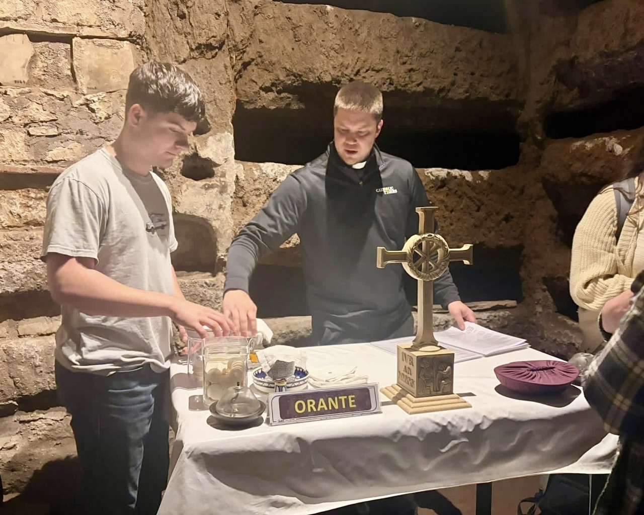 Fr. Andy Hammeke inside the Catacombs of St. Callisto in Rome, where Fort Hays State University Catholic Tigers held Mass underground in a tomb of early Christians who were killed and martyred during times when their faith was illegal. Courtesy photo