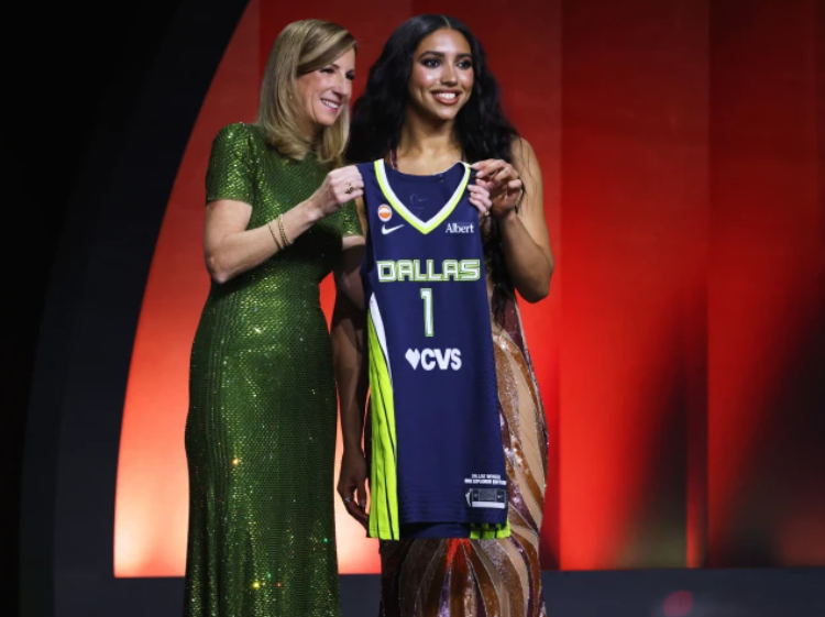 UConn guard Azzi Fudd poses with WNBA commissioner Cathy Engelbert after being selected first overall by the Dallas Wings in the first round of the WNBA basketball draft Monday, April 13, 2026, in New York. (AP Photo/Pamela Smith)