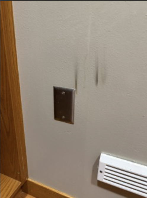 Outlet the juveniles attempted to cause a fire was unsuccessful - Photo, Saline County Sheriff's Office