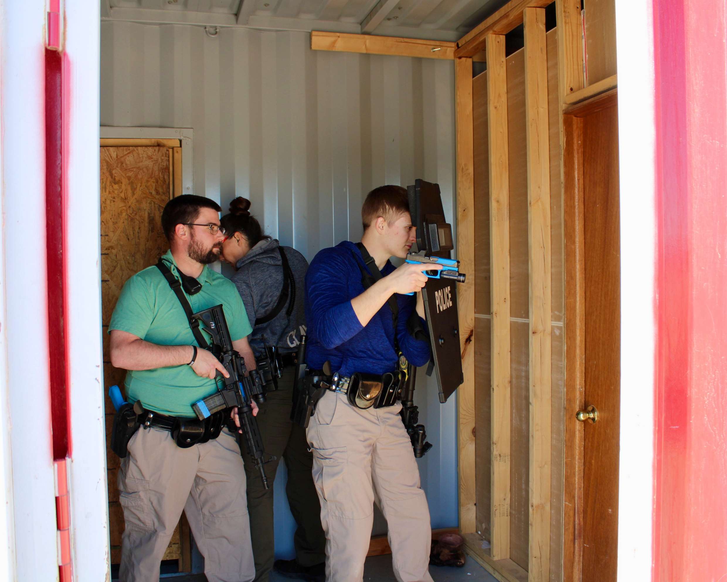 Hays police officers preparing to make entry into a room during a training session. Photo by Tony Guerrero/Hays Post