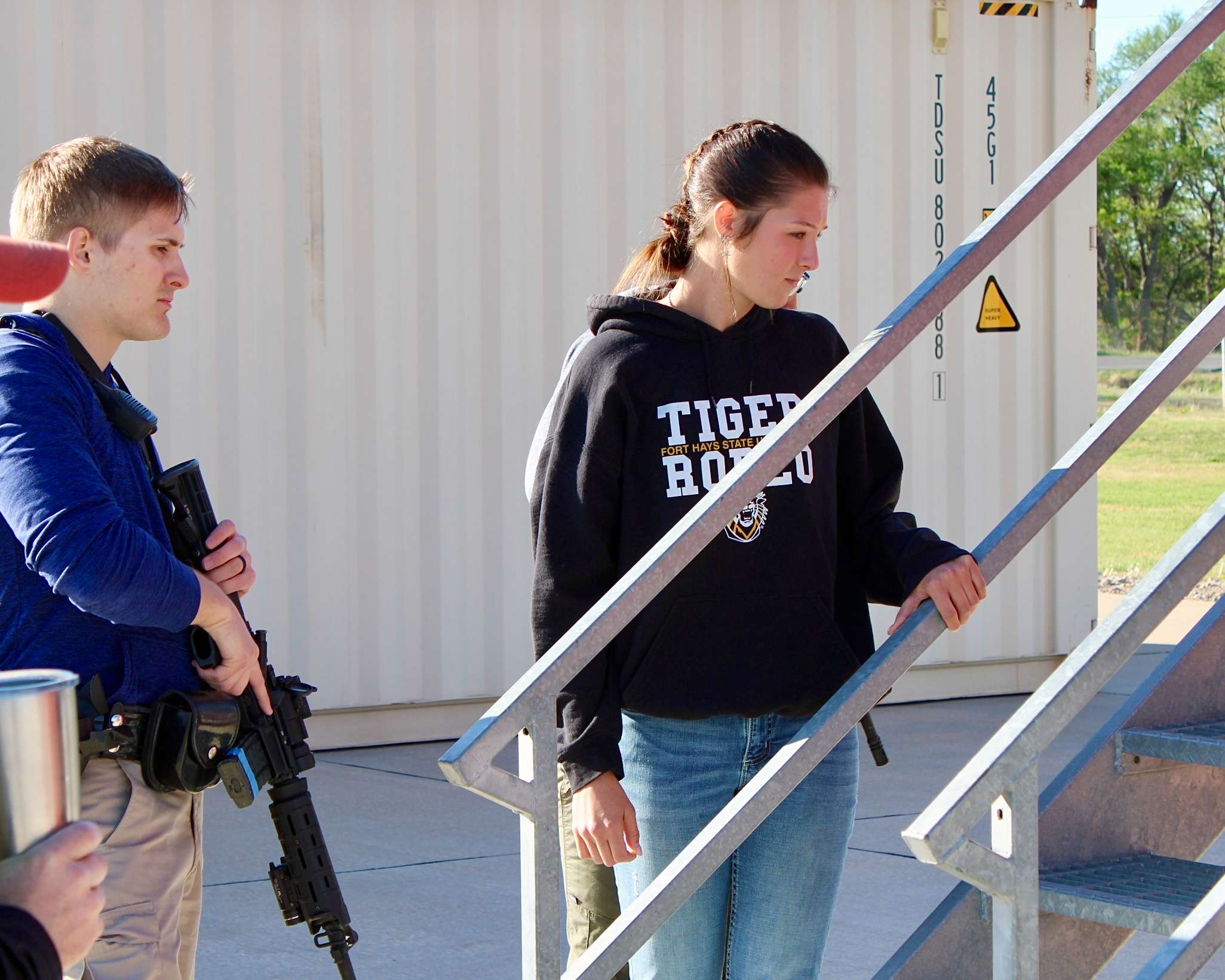 A role-playing civilian who was safely evacuated from a simulated critical response situation. Photo by Tony Guerrero/Hays Post