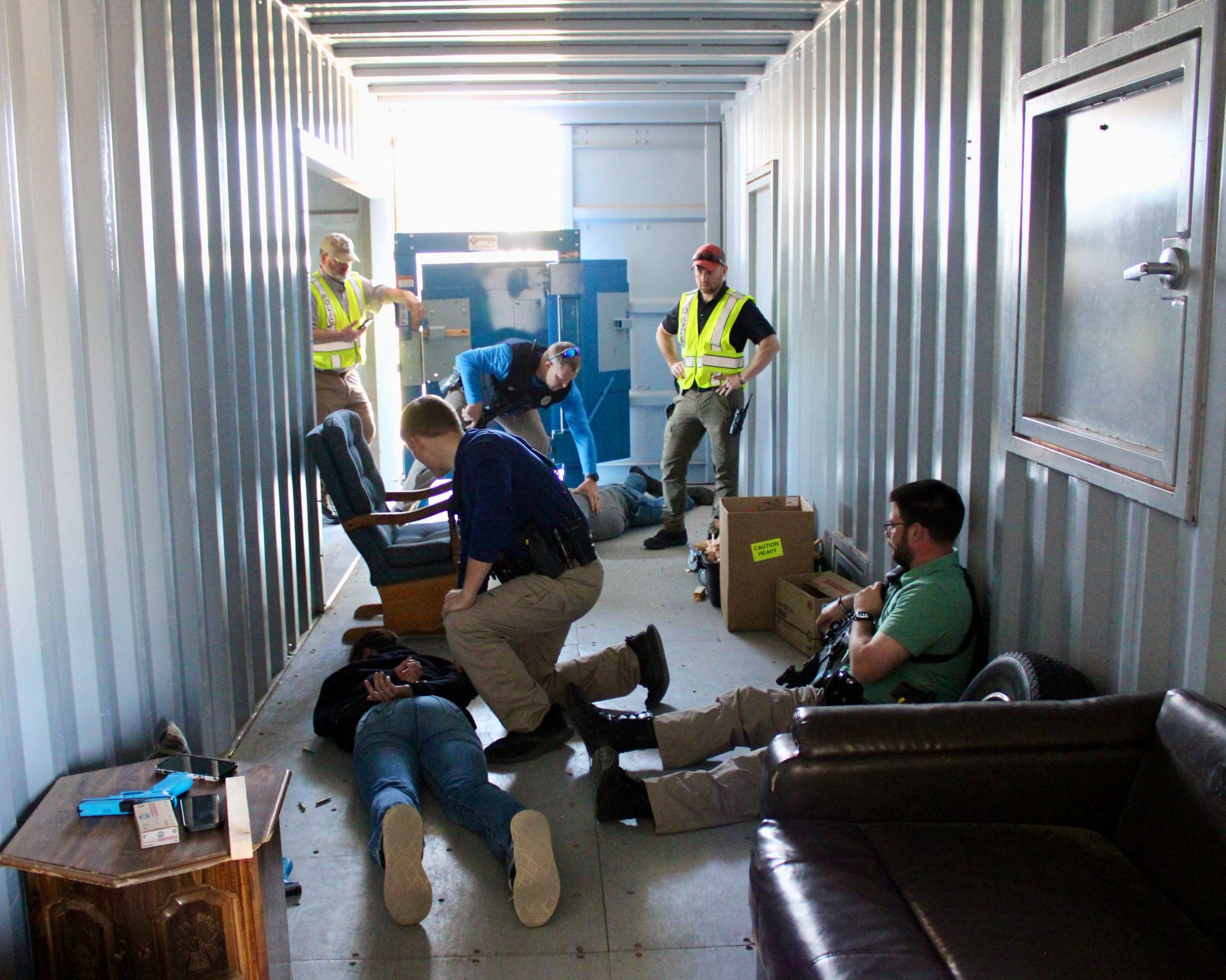 The training scene for a&nbsp;critical incident response with Hays police officers being watched by instructors. Photo by Tony Guerrero/Hays Post