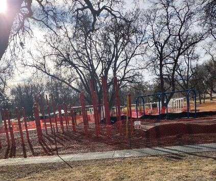  Orange fence surrounds the disappearing Central Park playground March 8. The project design shows the first significant change since the mid-'90s for the space.