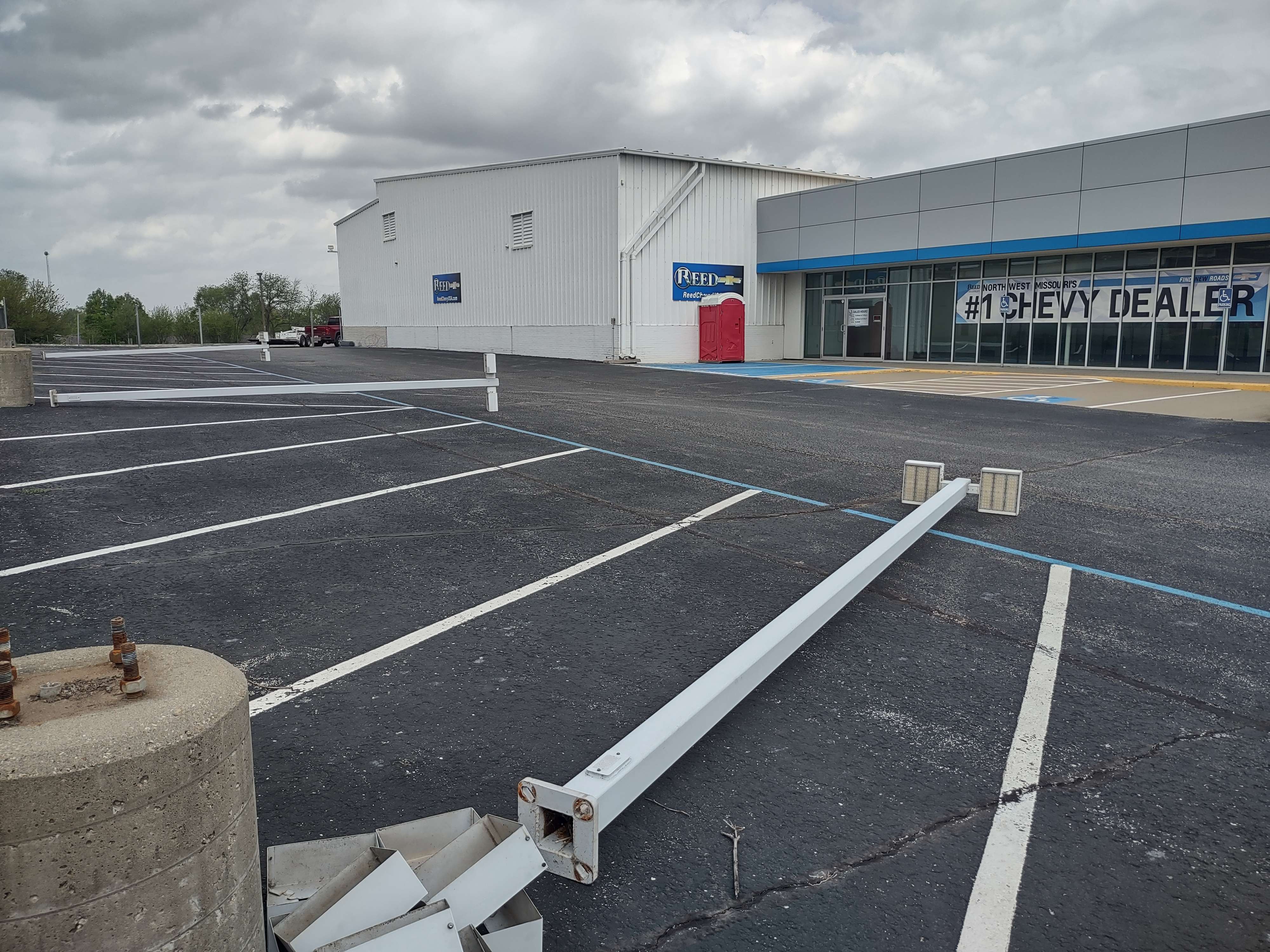 Poles torn down Friday, the first step in demolition. Photo by Jim Faris.
