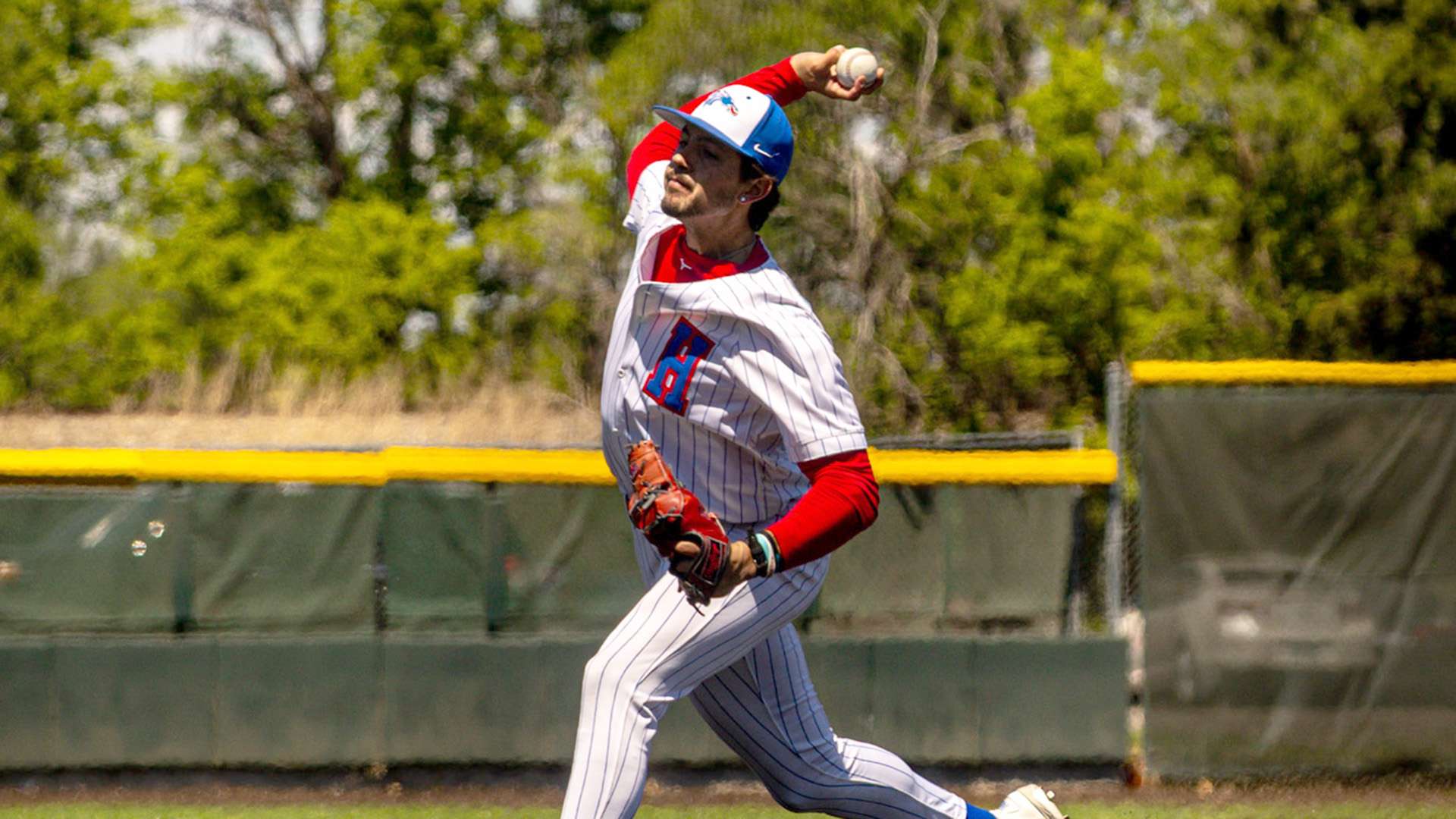 Karter Chamberlain tosses his first career complete game in a Blue Dragon 10-4 Jayhawk West victory over Seward County on Saturday at Hobart-Detter Field. (Sydney Holzrichter/Blue Dragon Sports Information)