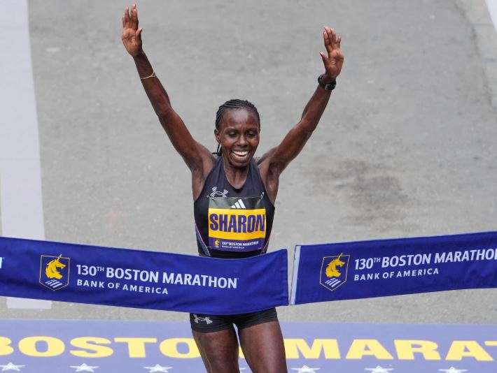 Sharon Lokedi of Kenya, celebrates after winning the women's division of the Boston Marathon, Monday, April 20, 2026, in Boston. (AP Photo/Charles Krupa)