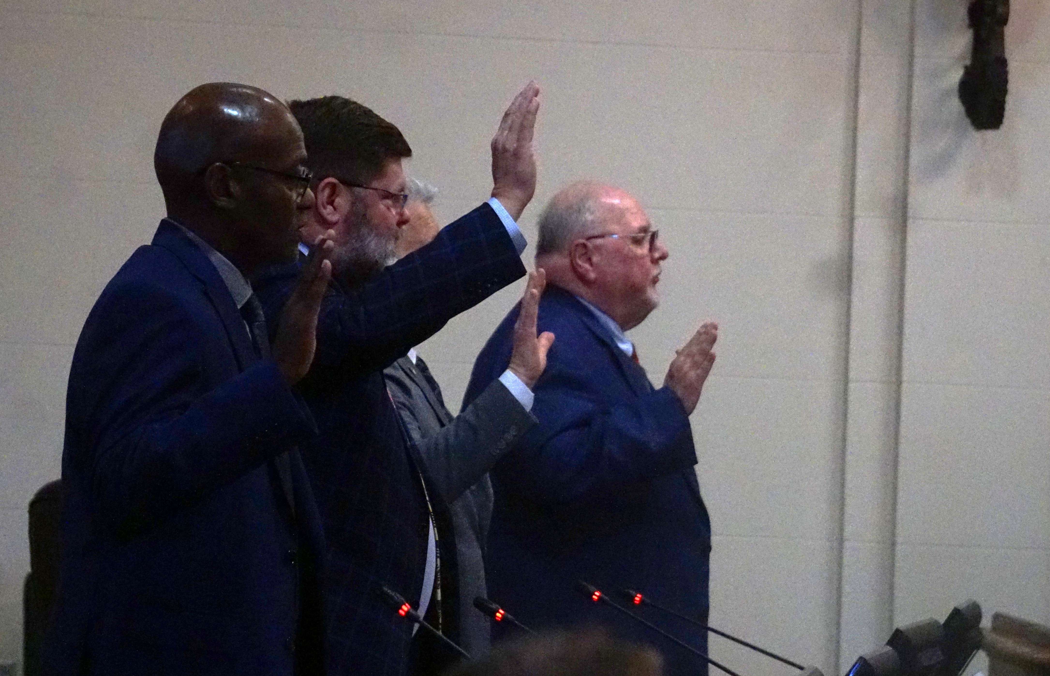 Councilmembers Gary Wilkinson, Andrew Trout, Randy Schultz, and Marty Novak take the oath of office/ Photo by Matt Pike