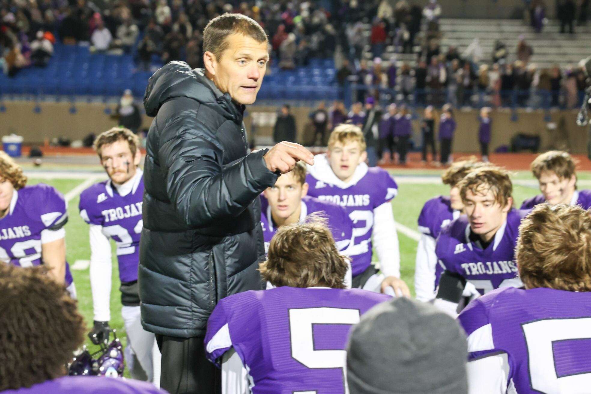 Coach Gebhardt speaks to his team following a state title-winning victory over Nemaha Central. Photo by Tanner Colvin.