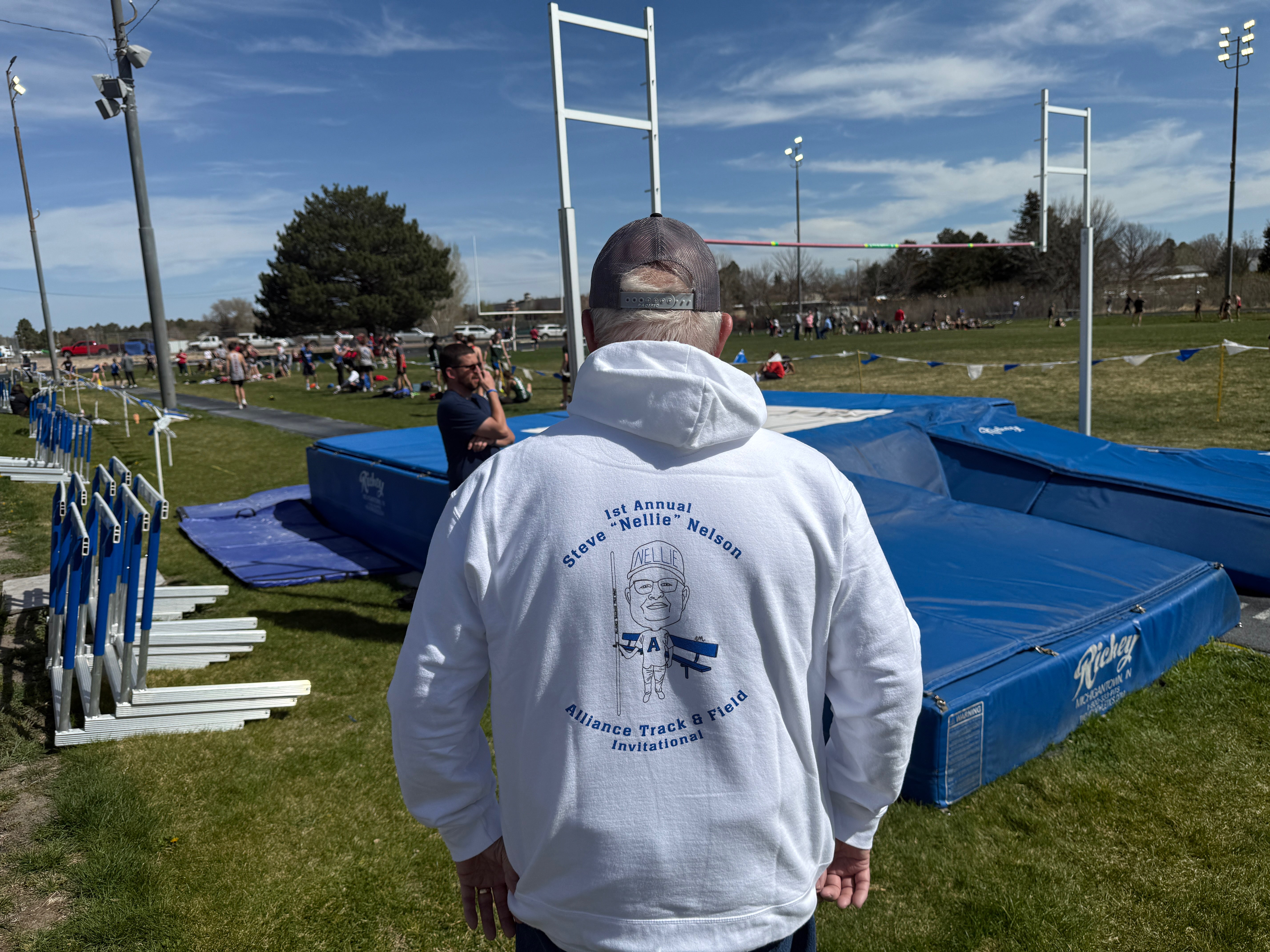 Steve “Nellie” Nelson gives coaching advice to student athletes at the pole vault event of the “Steve ‘Nellie’ Nelson Alliance Track and Field Invitational” in Bulldog Stadium on April 20, 2026 (photo courtesy Jake Schrantz).