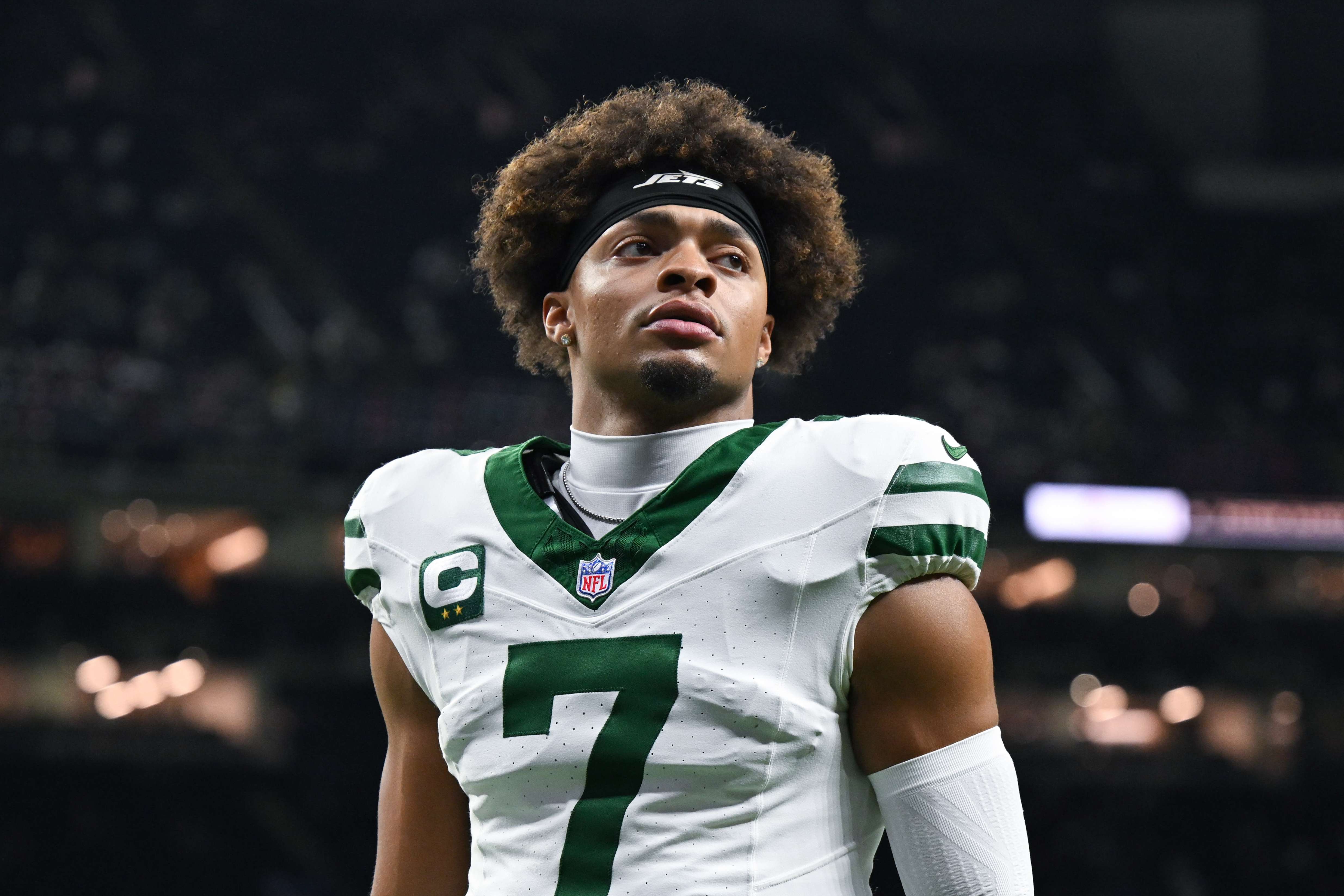FILE - New York Jets quarterback Justin Fields warms up before an NFL football game against the New Orleans Saints on Dec. 21, 2025, in New Orleans. (AP Photo/Ella Hall, File)