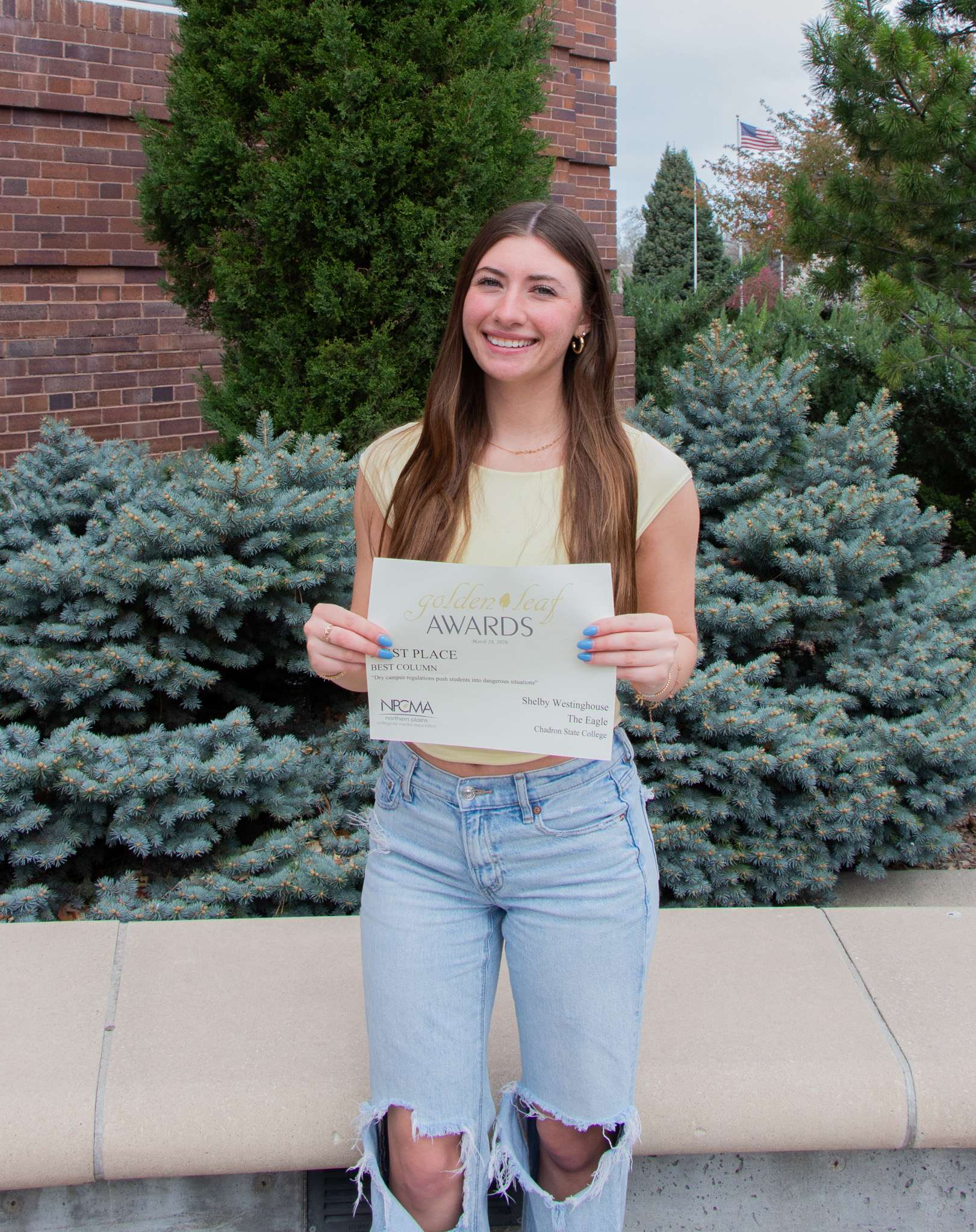 Chadron State College student Shelby Westinghouse of Hot Springs, S.D., received an award of distinction at the Golden Leaf Awards contest sponsored by the Northern Plains Collegiate Media Association. She is the first-place winner in the Best Column category for her published opinion piece on dry-campus regulations, April 16, 2026. (Photo by Taylor Neugebauer/Chadron State College)