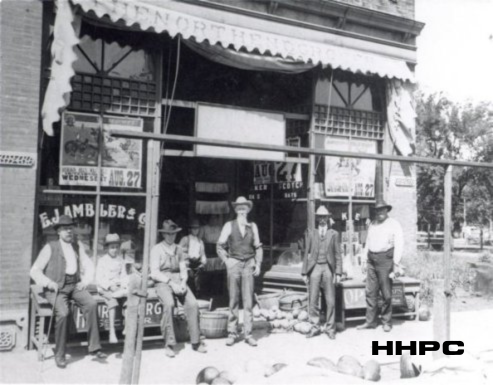 Carnegie Library - Ambler E.J. (John) North End Grocery - 425 N. Main - 1902 (John Ambler in Middle, His Son, Harry, Behind Him). Courtesy of the Conard-Harmon Collection.
