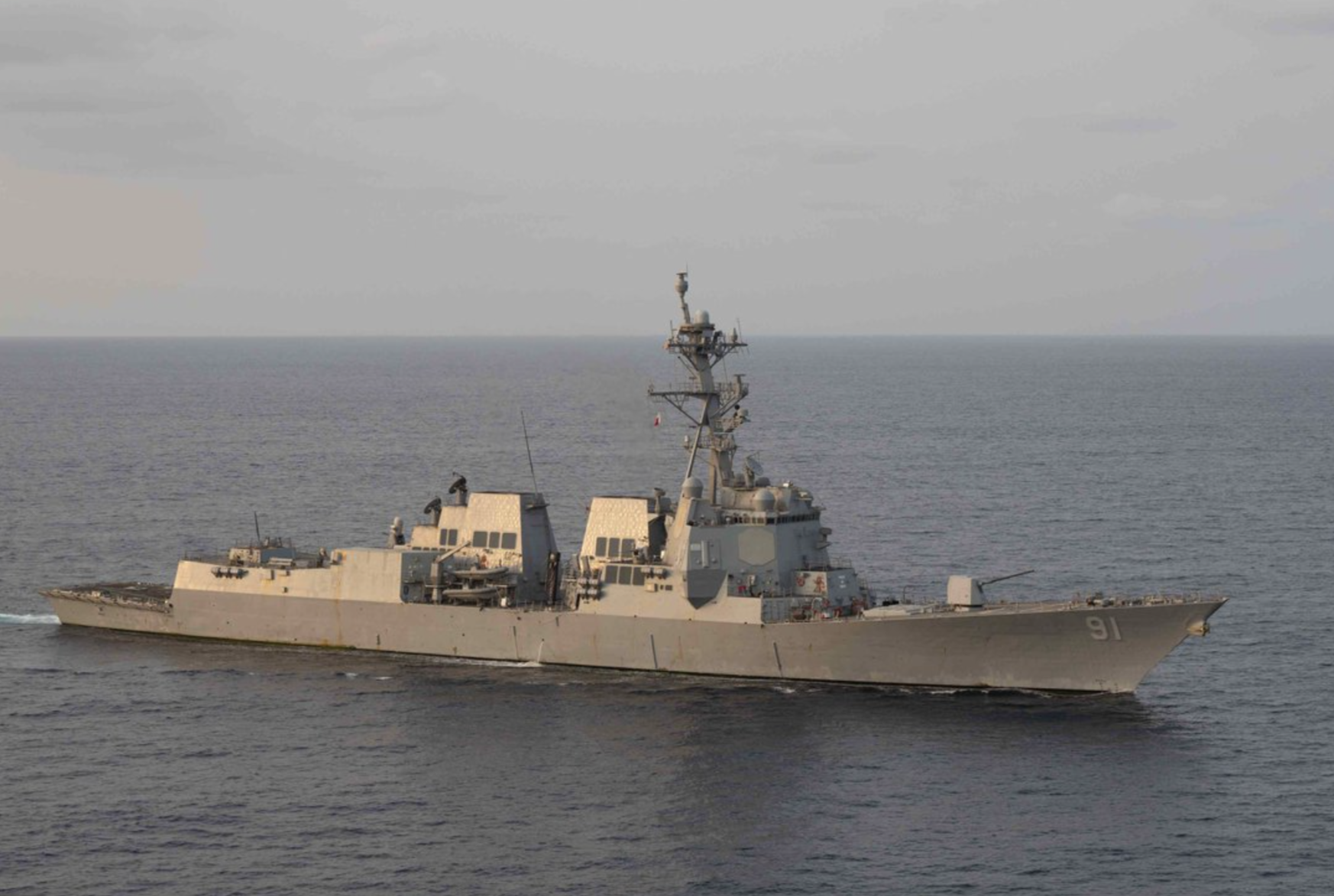 File photo -Guided-missile destroyer USS Pinckney (DDG 91) patrols regional waters in support of blockade operations.  The blockade has completely halted economic trade going into and out of Iran by sea. Photo U.S. Central Command