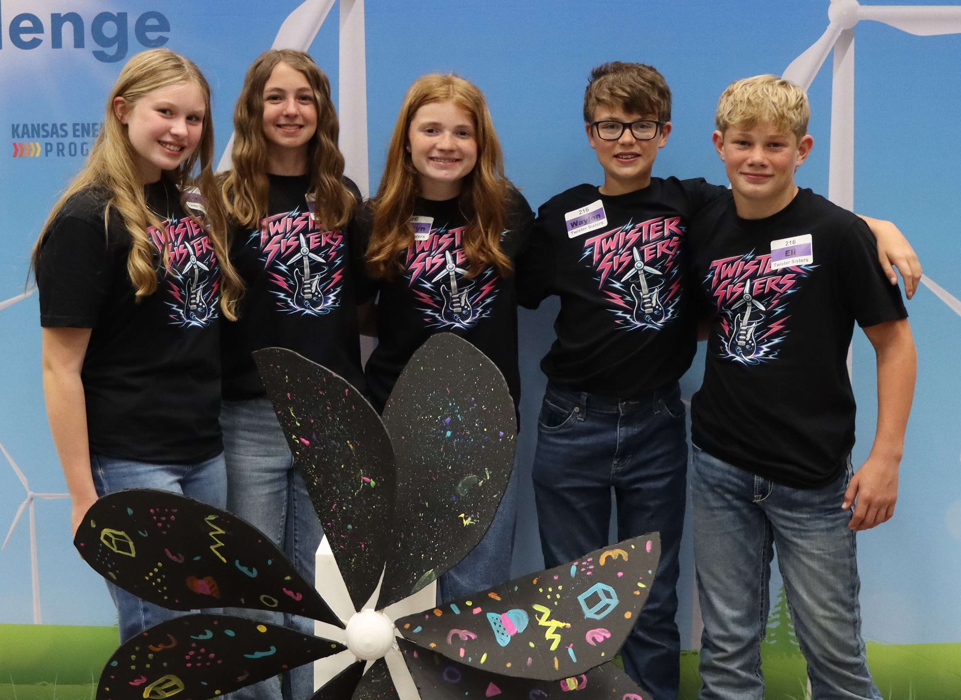 Oakley Middle School (<a href="https://links-2.govdelivery.com/CL0/https:%2F%2Fwww.kcc.ks.gov%2Fimages%2FPress_Links%2F2026%2520State%2520KidWind%2F2026%2520state%2520winner%2520photos%2FOakley-TwisterSisters_14Turbine.jpg%3Futm_medium=email%26utm_source=govdelivery/1/0101019db18920e8-aa11c1c9-749e-4f79-9ab9-57425ab5e962-000000/l7yQHkcxa_aM9xfnUev3jCvNIB_oWo_CBqnUVHTwzy4=452" target="_blank">Twister Sisters</a>), Oakley