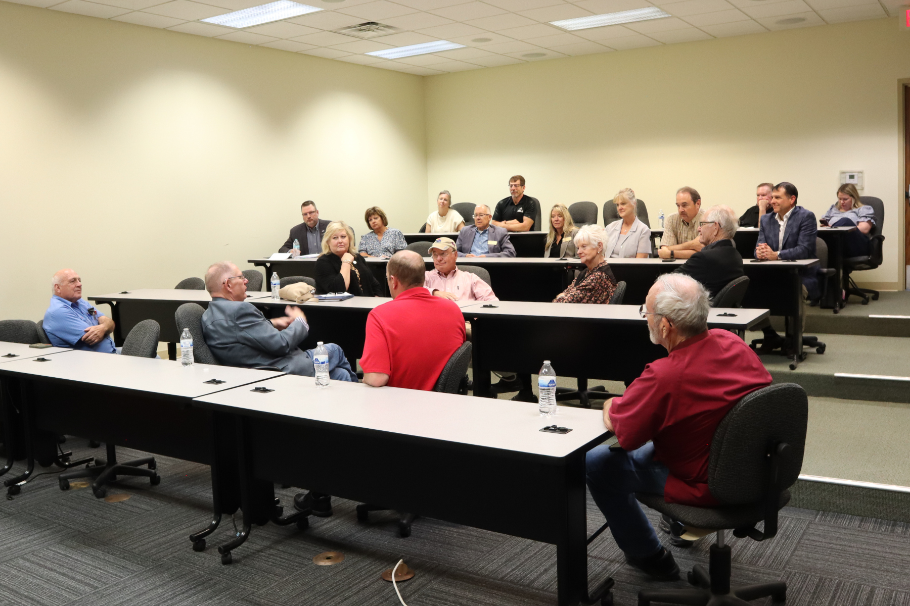 Local leaders, legislators, and community members participate in open discussion during the Farm Bureau legislative update.