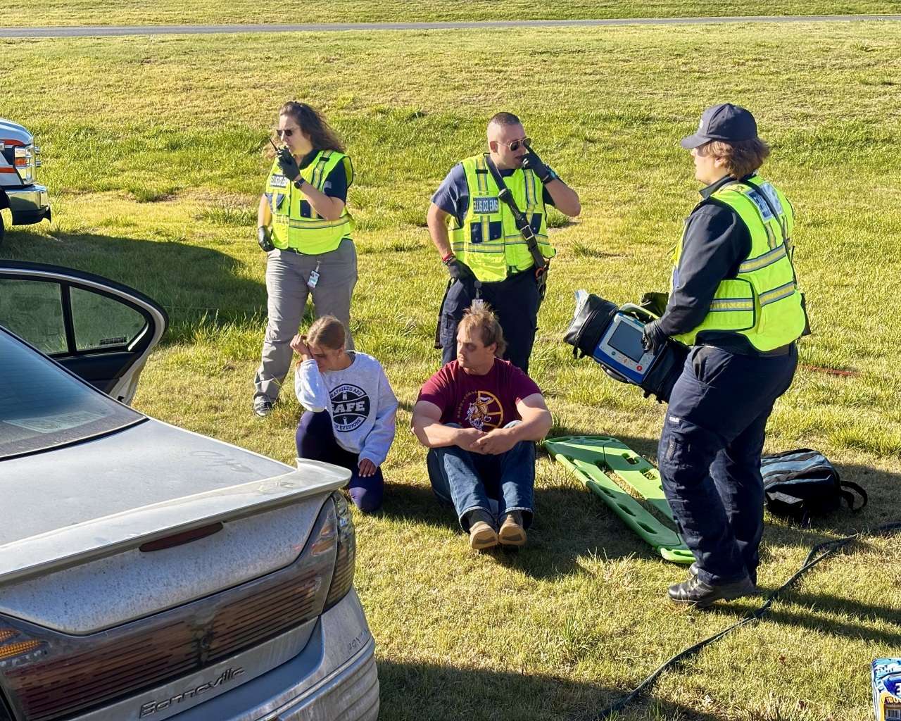 Two role-playing victims after the simulated car accident during a mock crash at Victoria High School. Photo by Tony Guerrero/Hays Post