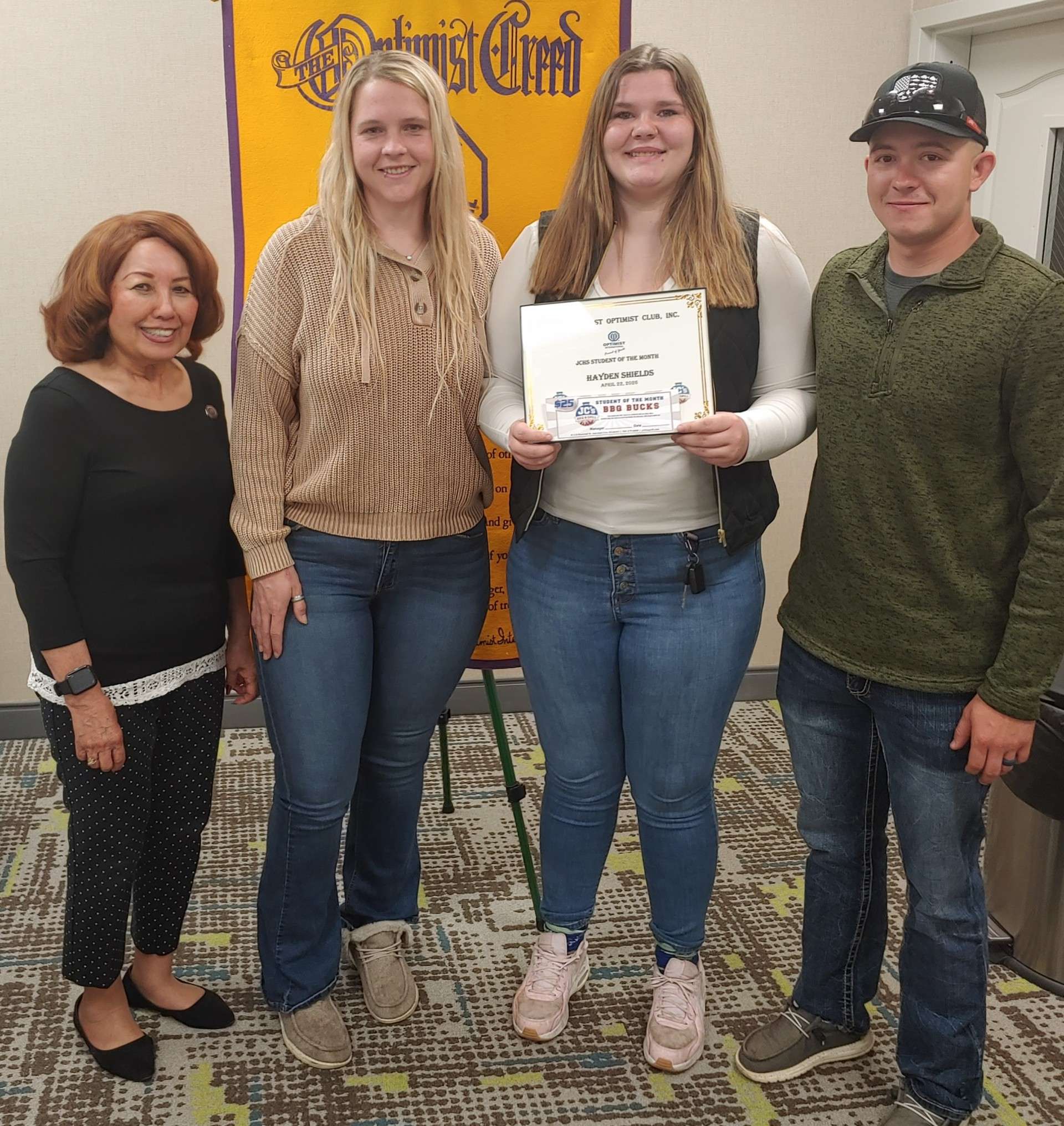 Pictured left to right are Nita Miller, JC Breakfast Optimist Club President; Carly Shields, Hayden's mother; Hayden and Wade McKinney, father.&nbsp;&nbsp;
