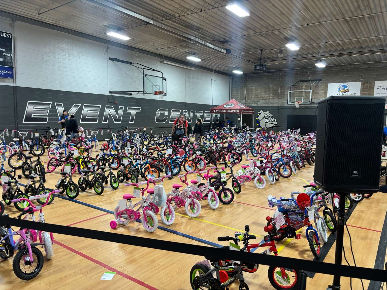 Rows of donated bicycles filled the gym floor Saturday as 278 bikes were raffled off to children during the annual family appreciation event hosted by Guardians of the Children. (The Post)