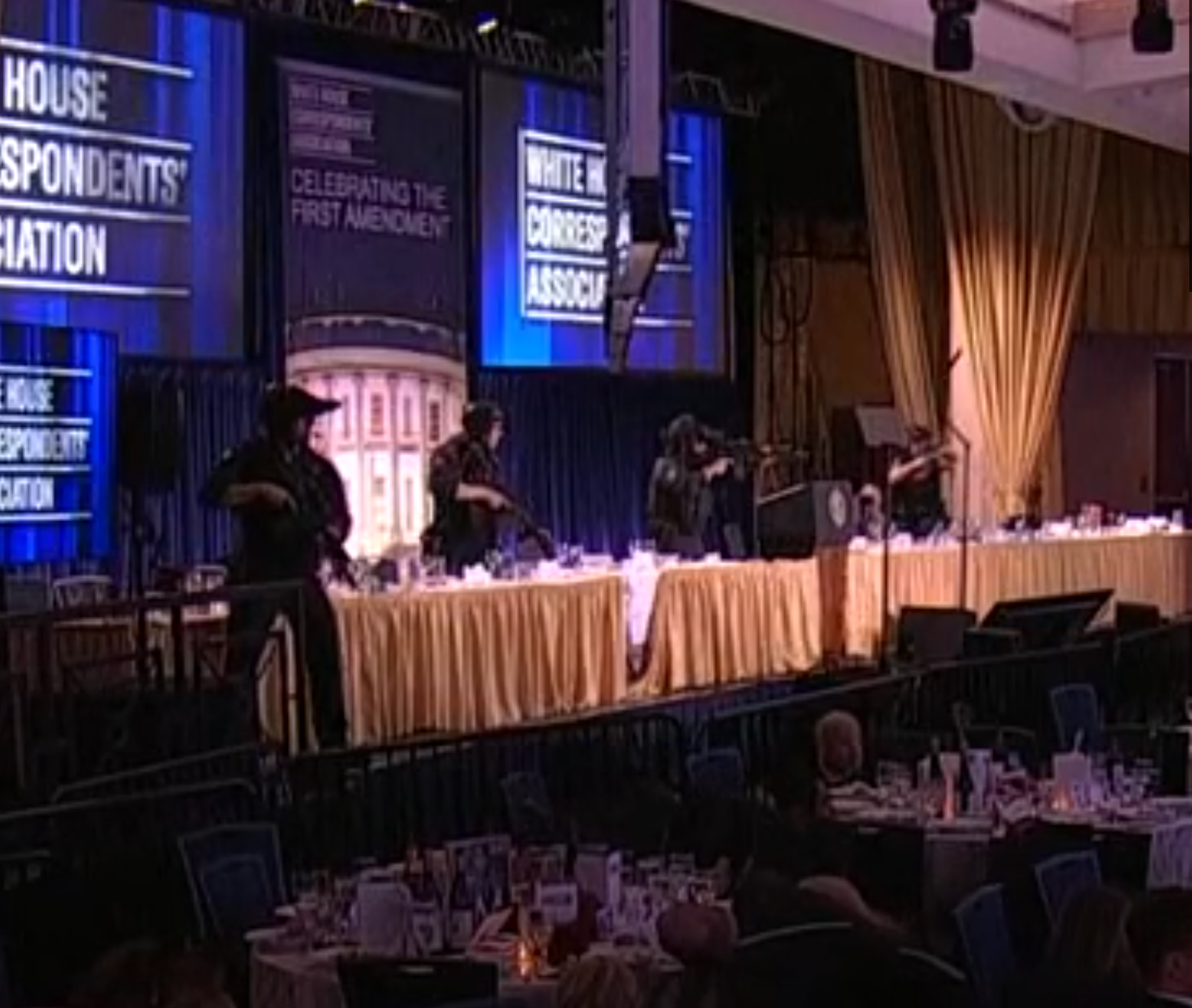 Secret Service on the stage after the evacuation -image courtesy CSPAN