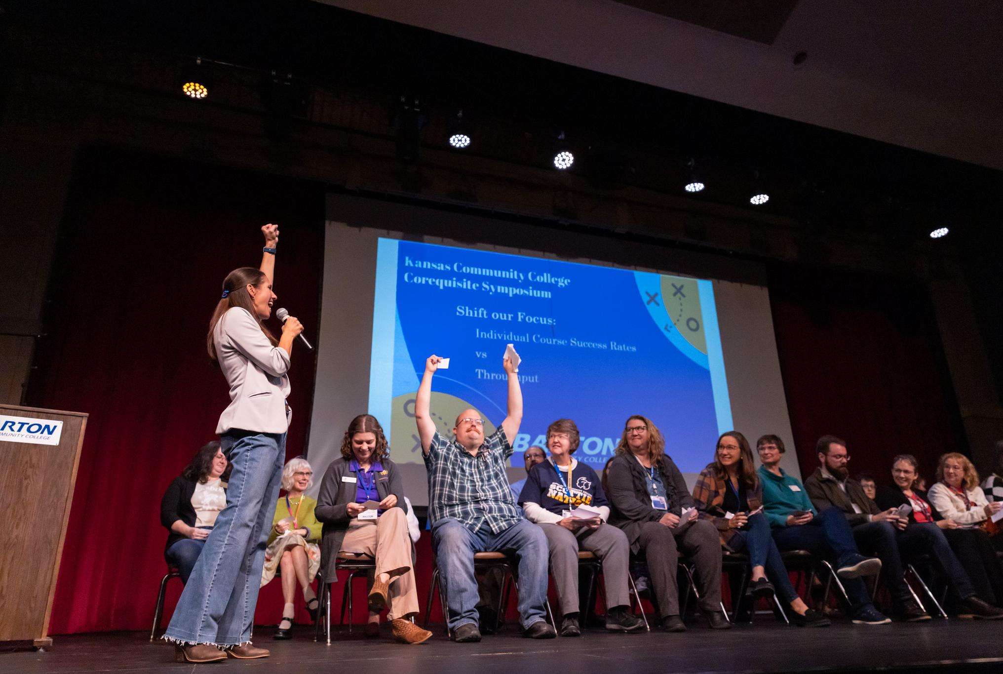 Barton's Dean of Academics Dr. Stephanie Joiner leads an activity on the stage of the Fine Arts Auditorium with attendees of Barton’s First Annual Corequisite Symposium held this past fall on the Barton Campus. (photo by Joe Vinduska/BCC)