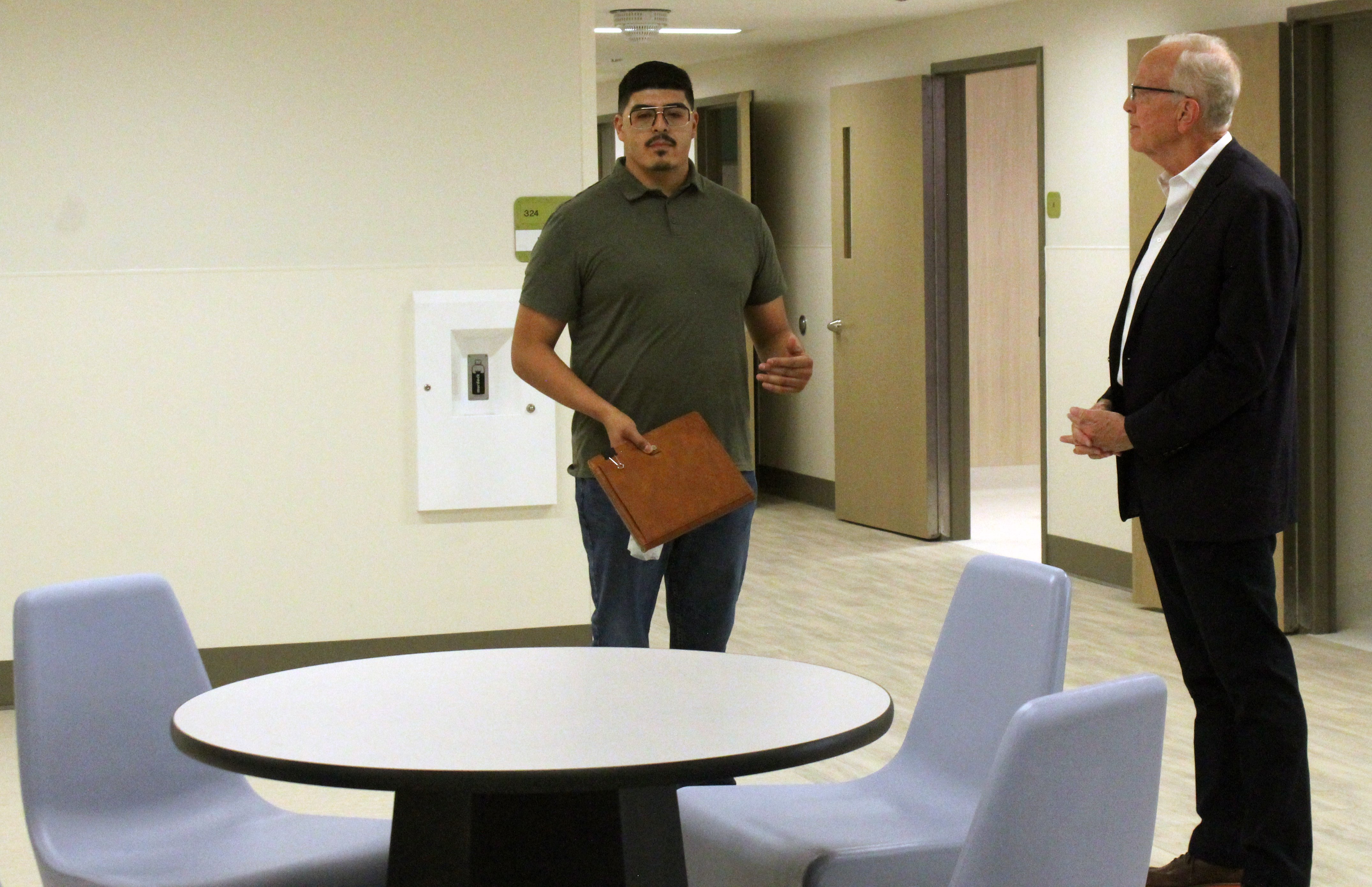 Benito Rivera-Madrid, Crisis Intervention Center operations manager, discusses the center during a tour on Thursday. The center will be able to accommodate 16 patients.&nbsp;Photo by Cristina Janney/ Hays Post<br>