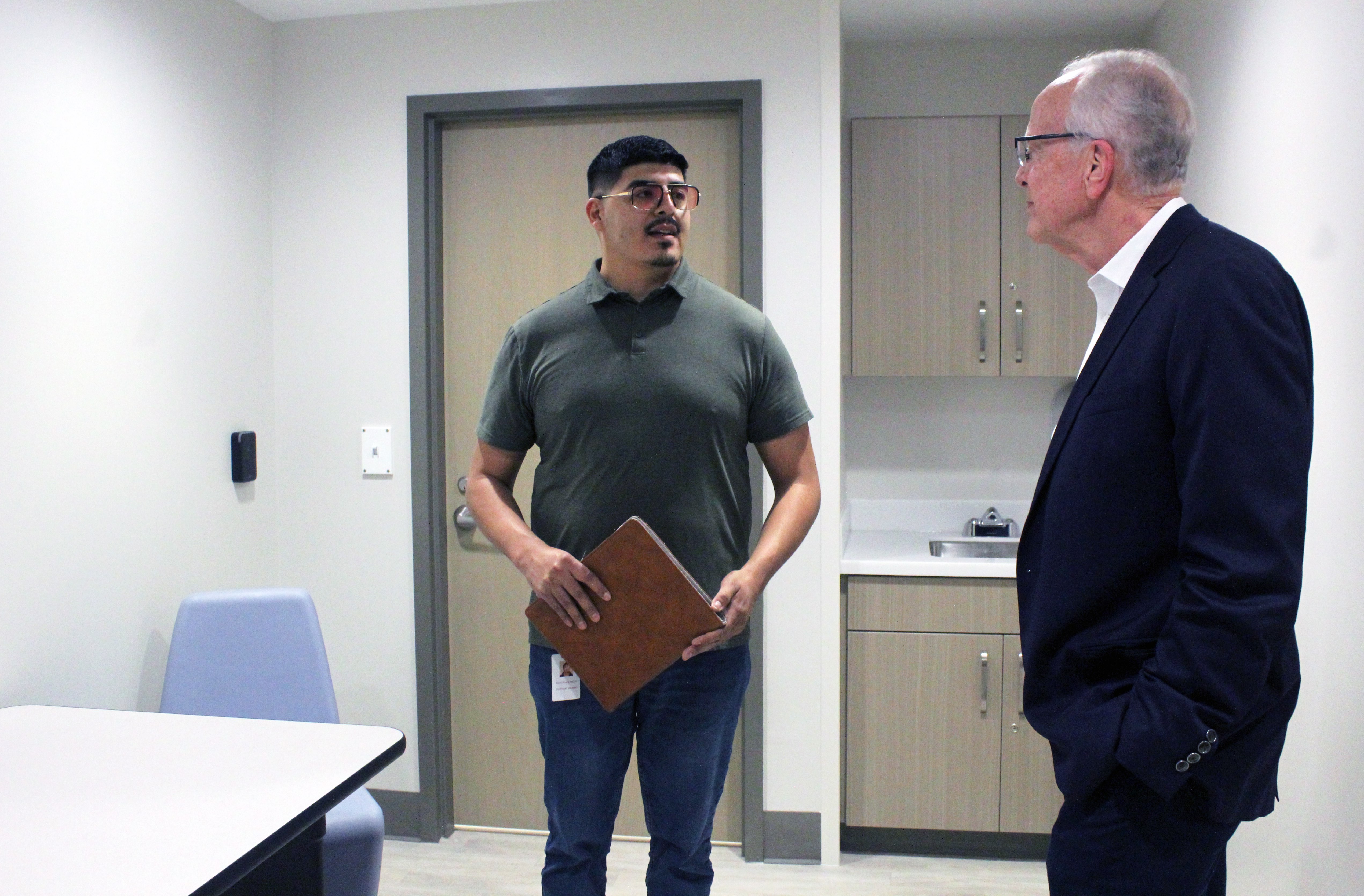 Benito Rivera-Madrid, Crisis Intervention Center operations manager, &nbsp;in the center's intake room. The center will treat voluntary, involuntary and sobering patients.&nbsp;Photo by Cristina Janney/ Hays Post<br>
