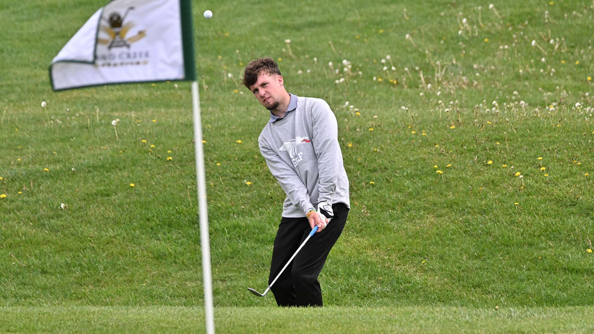 Sophomore Corey Scullion shoots an opening-round 69 on Monday to lead the Blue Dragon men's golf team at the Plains District Tournament in Springfield, Missouri. (Andrew Carpenter/Digital Fox Photography).