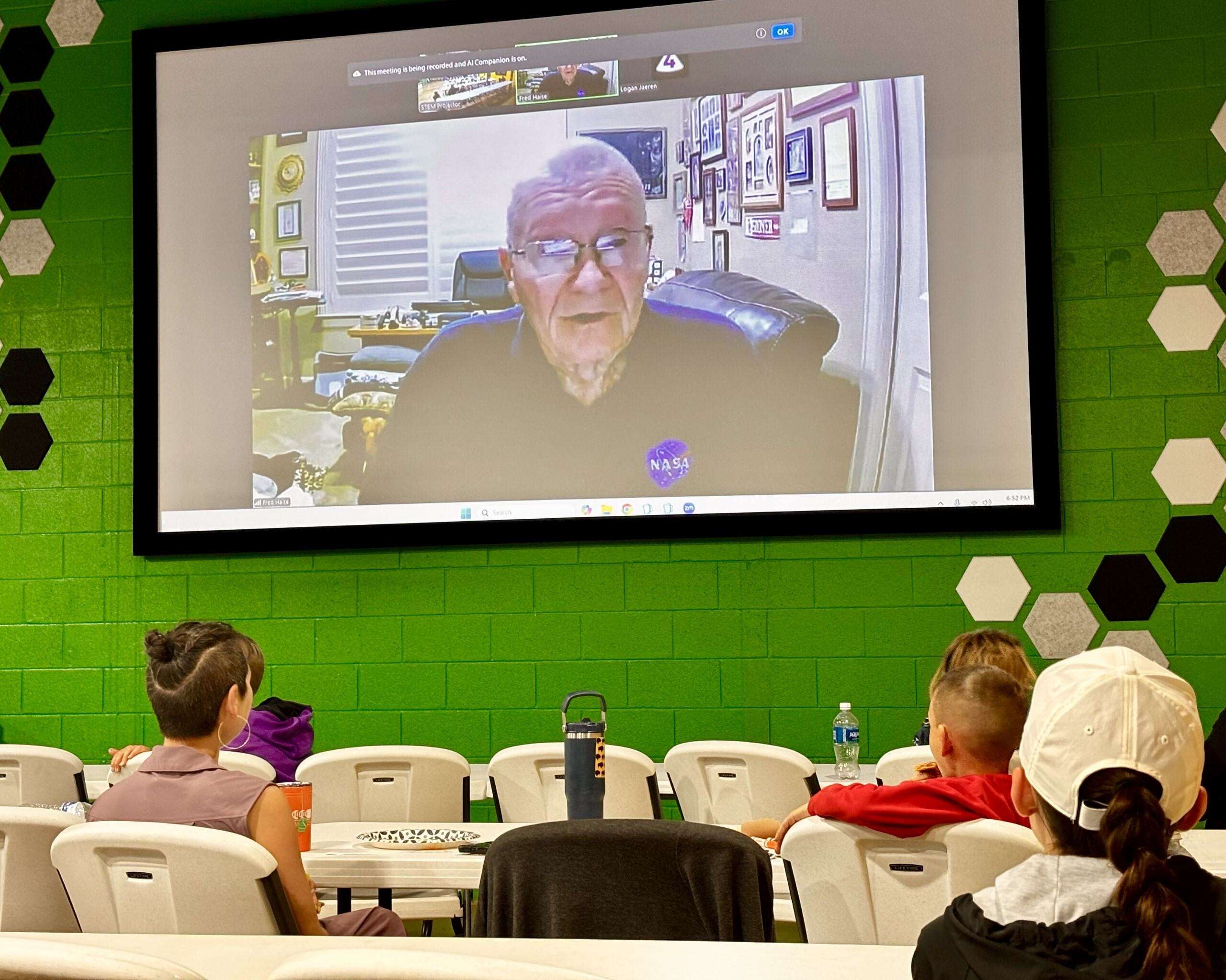 Apollo 13 Lunar Module Pilot Fred Haise virtually answering questions at STEM Harvest. Photo by Tony Guerrero/Hays Post