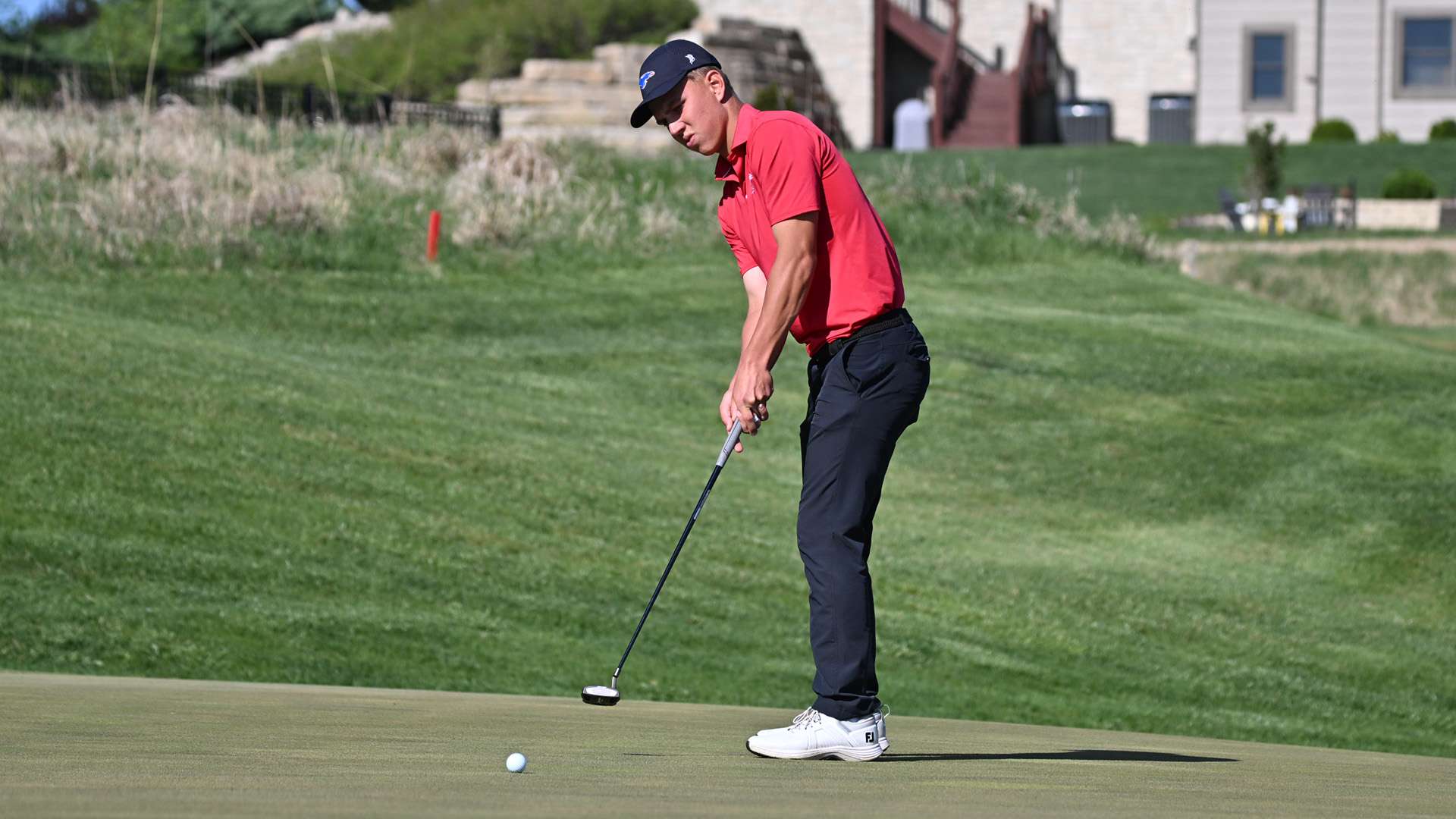 Grant Hatzenbuhler jumps eight spots to finish 13th and help the No. 7-ranked Blue Dragon men's golf team to its 25th-consecuitve NJCAA Tournament qualification on Tuesday in Springfield, MO. (Steve Carpenter/Blue Dragon Sports Information)