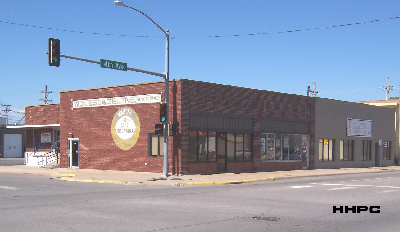 Bornholdt Feed &amp; Seed - Woleslagel Insurance - 25 E. 4th -  June 21, 2018. Courtesy of the Conard-Harmon Collection.