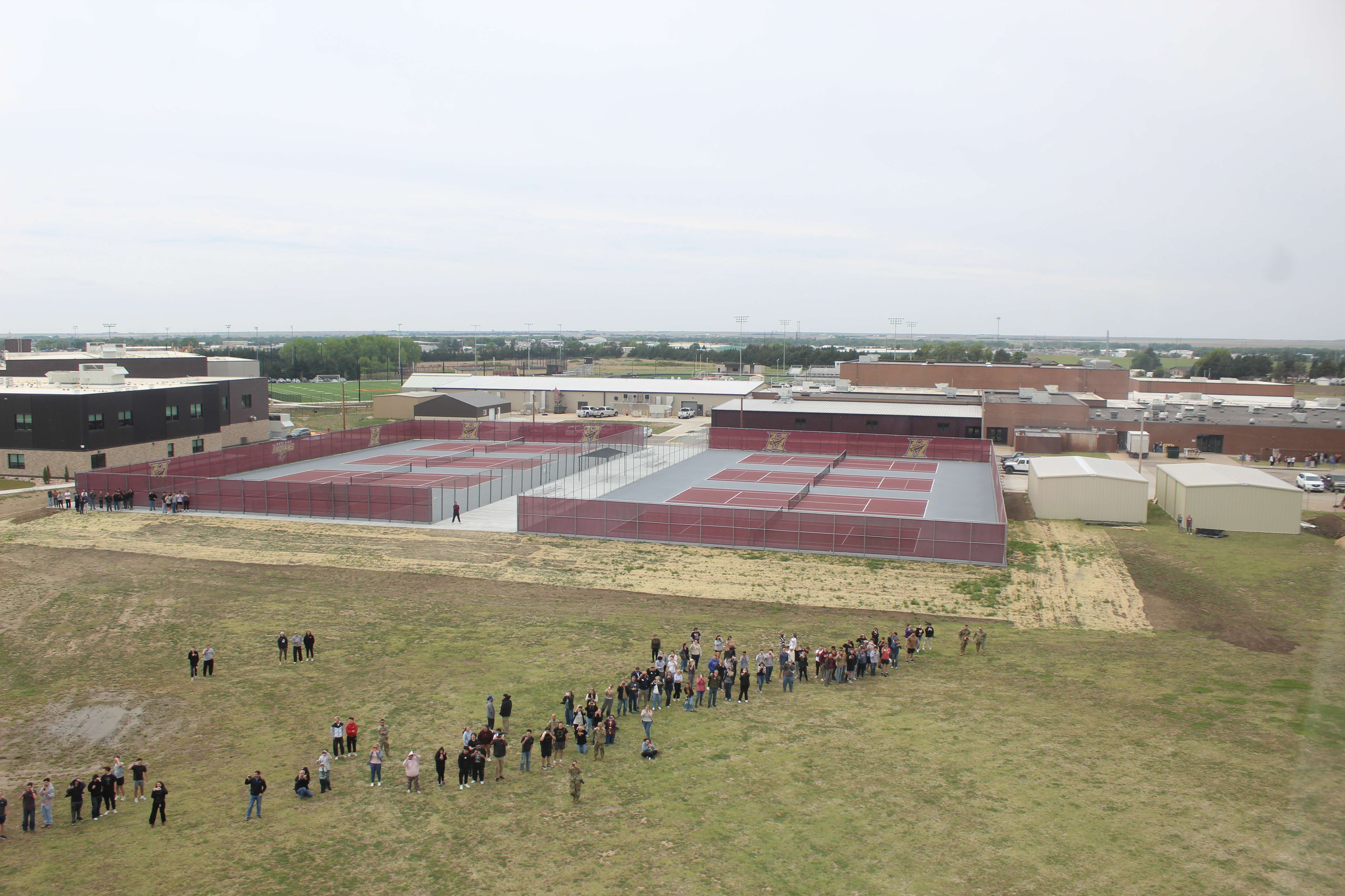 Hays High students and staff watch the Blackhawks take off Wednesday from Hays High.&nbsp;Photo by Cristina Janney/Hays Post