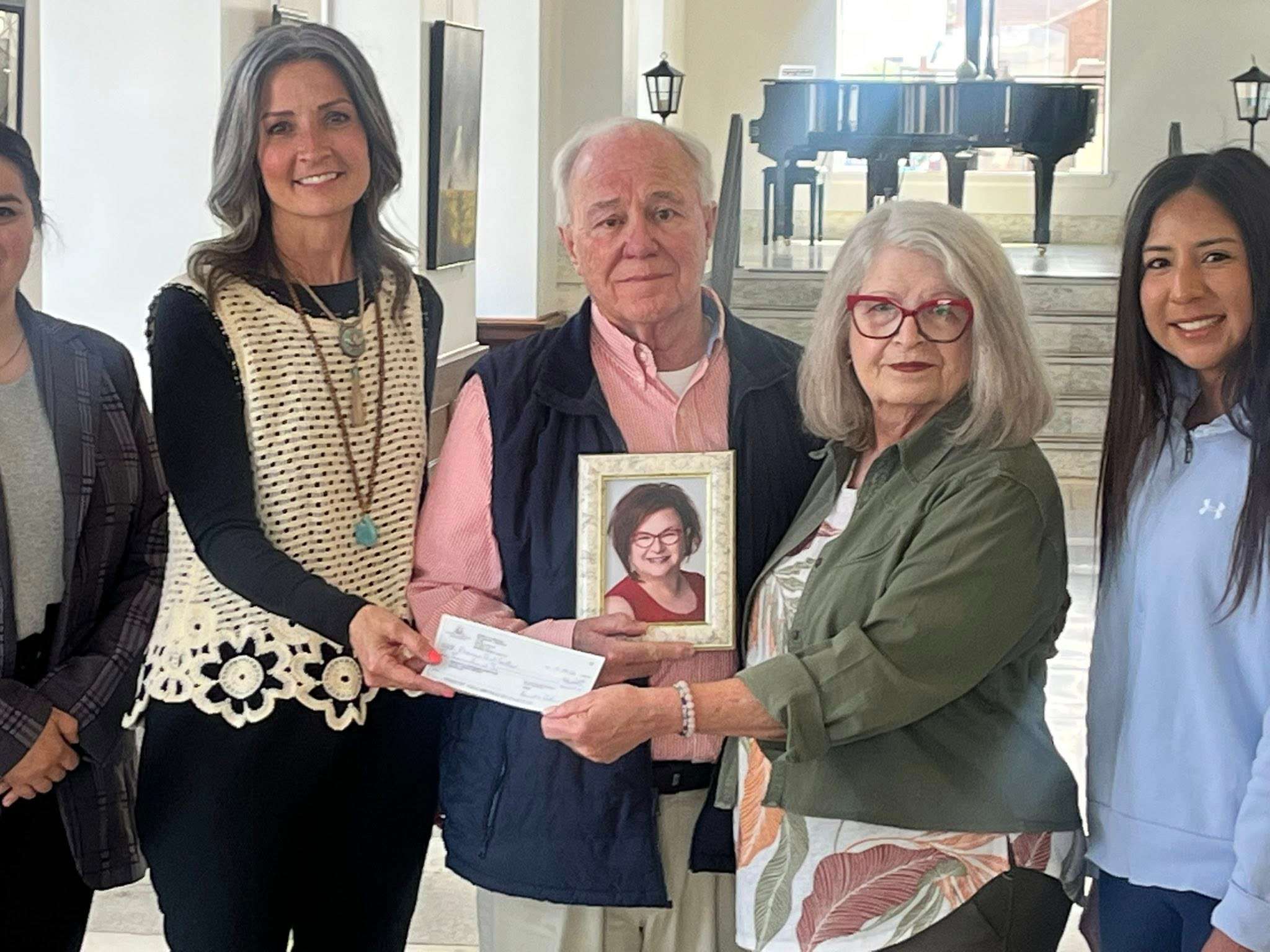 $10,000 Giving Day Gift to the Prairie Arts Center in memory of Erika Schmidt.&nbsp; Exec Dir Holly Carlini, Ken Anderson, Carolyn Anderson, V. Pres. Marissa Ramos