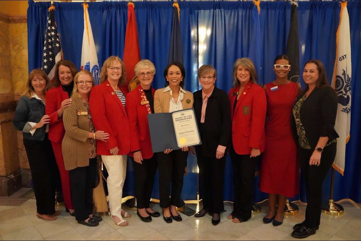 Michelle Rone, the wife of Fort Riley's Commanding General, Major Monte L. Rone, was presented with the Sunflower Award. Kansas Governor Laura Kelly presented the award to "The First Lady of Fort Riley" at the Kansas Statehouse on Tuesday. Pictured with Michelle Rone and Kansas Governor Laura Kelly is the Lady Troopers Organization. (Photo courtesy of Stephanie Rodriguez - JC Chamber of Commerce / Military Affairs Council)