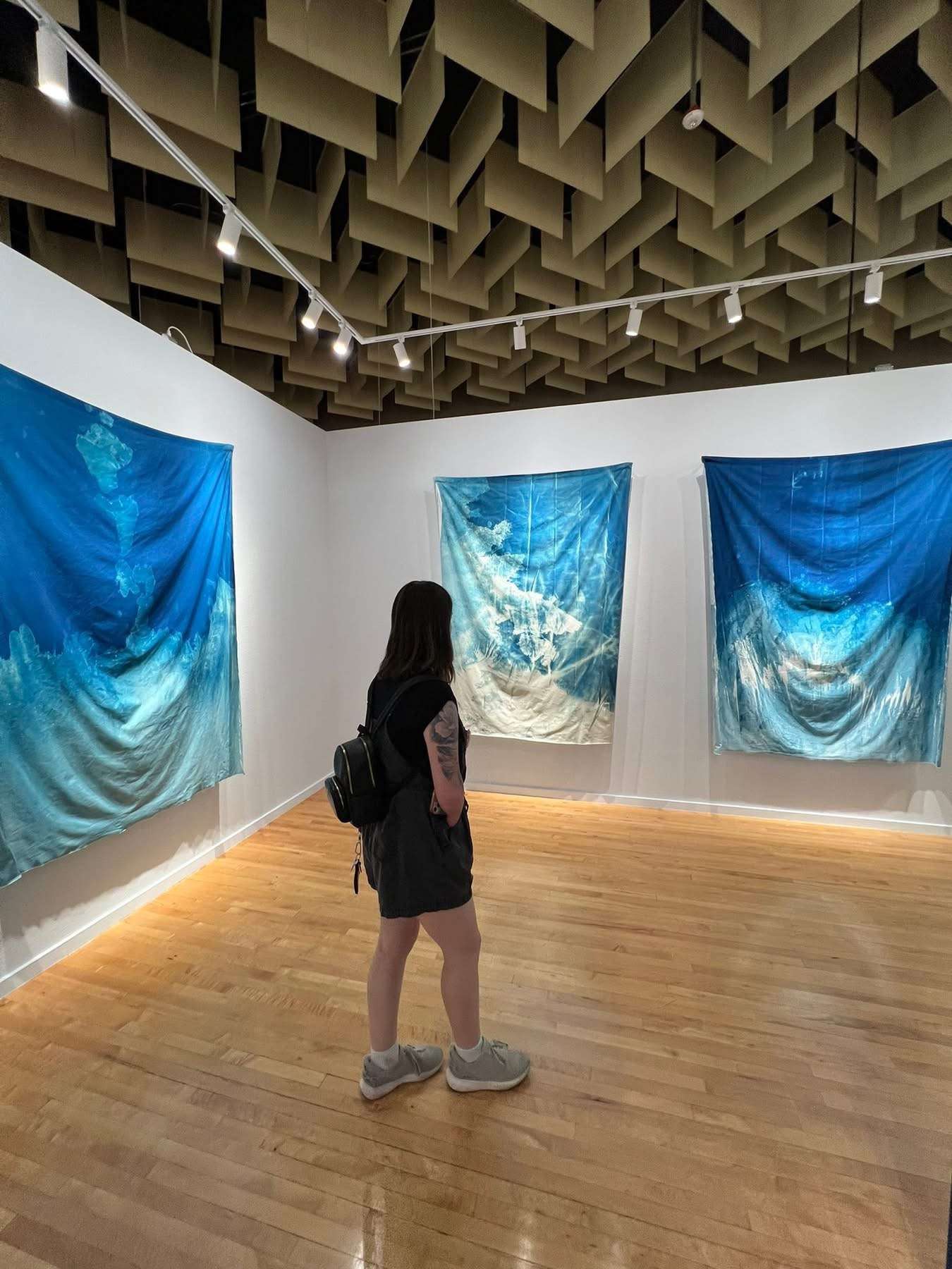 A Chadron State College student in the Art Guild views art at the Marjorie Barrick Museum of Art in Las Vegas DATE. (Courtesy photo, used with permission)