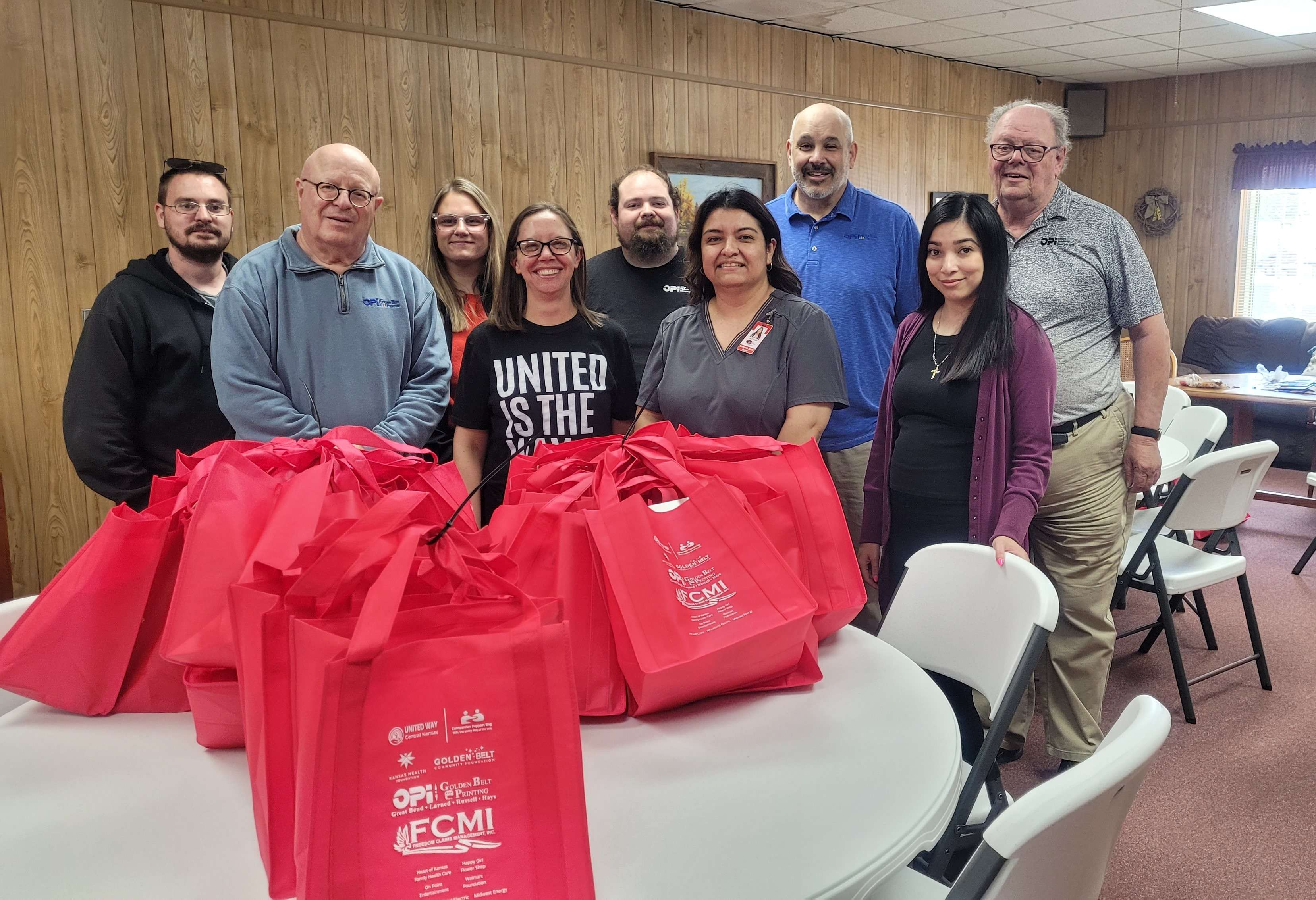 Pictured with Companion Support Bags, now available at four hospitals in Barton and Pawnee Counties, are several business sponsors and representatives from OPI, Heart of Kansas Health Center, and Golden Belt Community Foundation.
