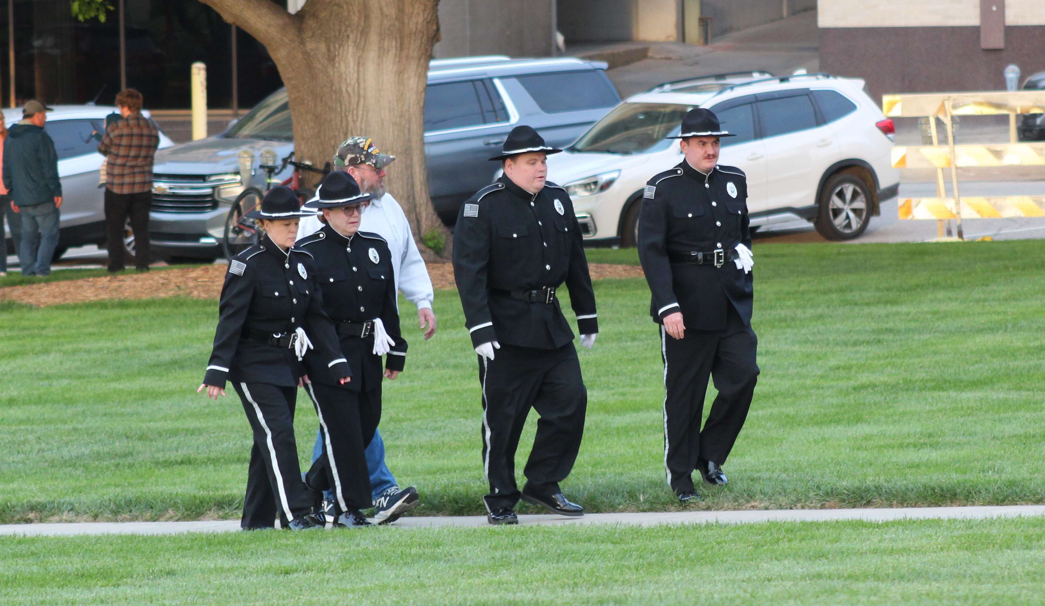 Officers preparing for the candle-light vigil at the Capitol on Thursday. Photo by Cristina Janney/Hays Post