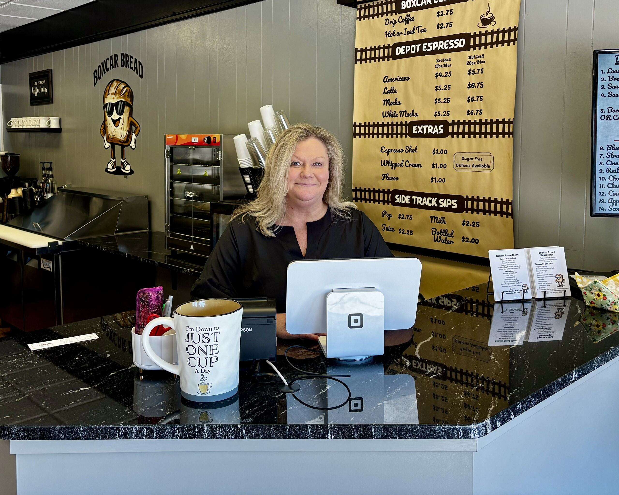 Tammy Wolf, owner of Boxcar Bread and a HaysMed operating room nurse, behind the counter of her bakery in Ellis. Photo by Tony Guerrero/Hays Post