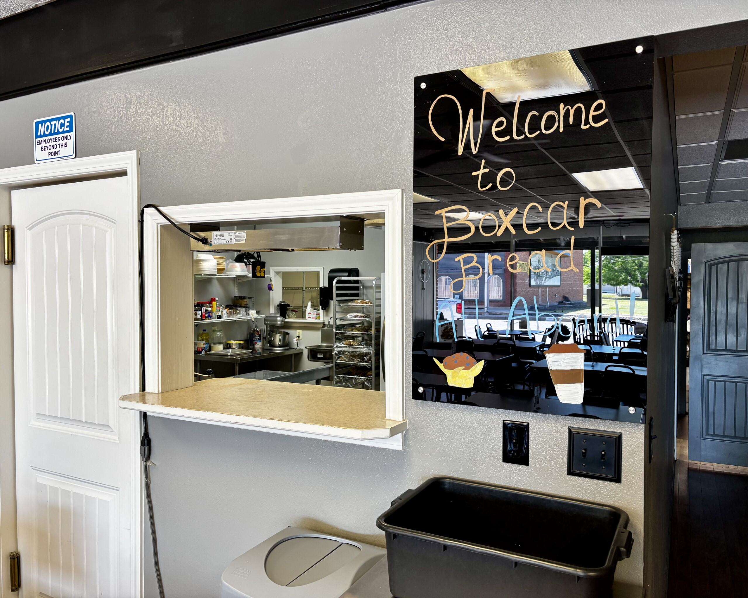 A window view into the back kitchen, where Tammy Wolf bakes and makes sourdough. Photo by Tony Guerrero/Hays Post