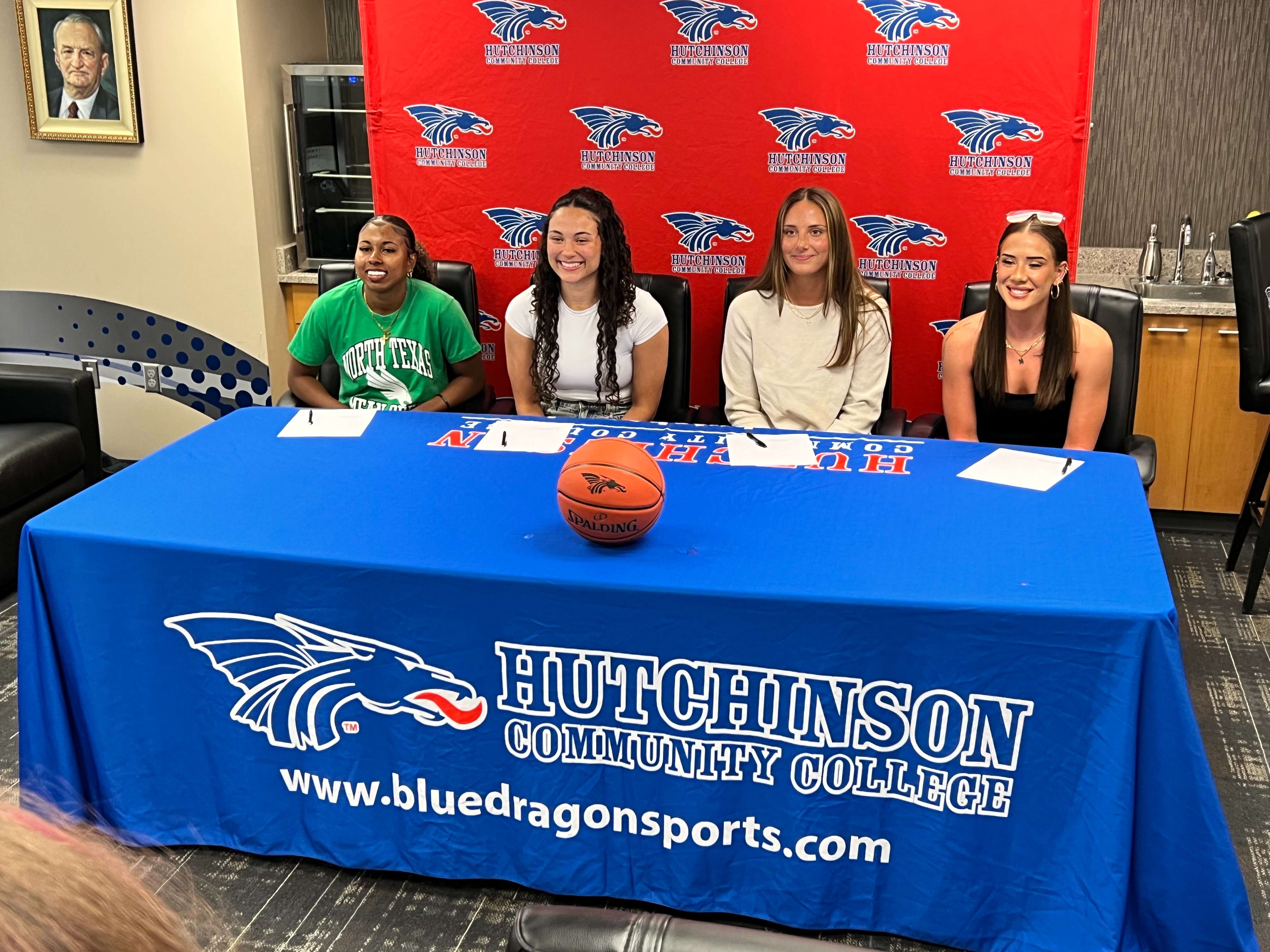Hutchinson Community College women’s basketball players, left to right, KaMyra Barber, Jaden Wilson, Noelle Anthon and Katie Duncan signed National Letters of Intent on Wednesday in the Club 1928 Room at the Hutchinson Sports Arena. Barber signed with North Texas, Wilson with Rockhurst, Anthon with Marquette and Duncan with New Mexico. (Hutch Post Photo/Sean Boston)