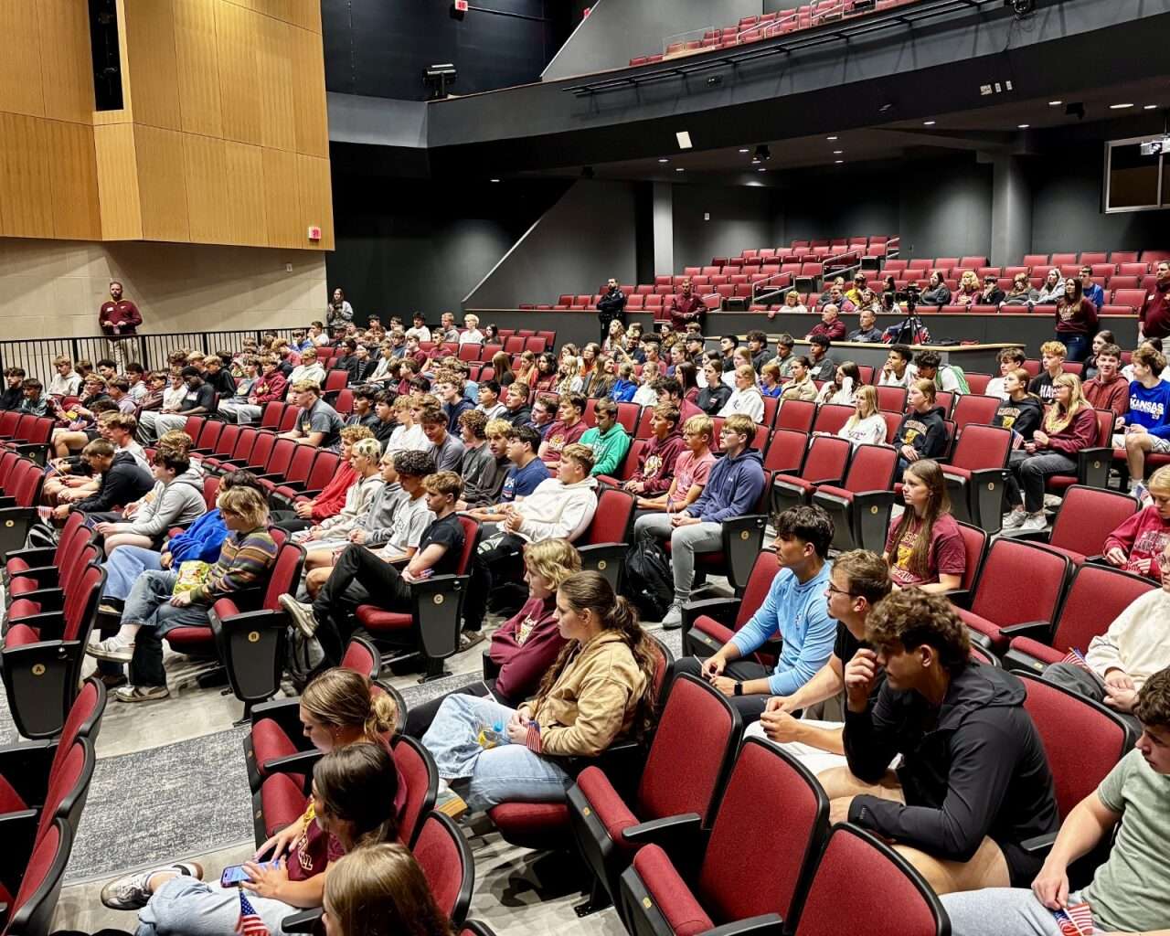 Hays High School students listening to Olympic athlete Kaillie Humphries about the obstacles she overcame in her career. Photo by Tony Guerrero/Hays Post