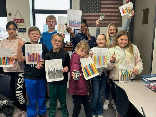 Cheylin 5th graders, Bird City, with their graphs of&nbsp; cows' milk production at McCarty Family Farms for "Milk Madness."&nbsp; Courtesy photo