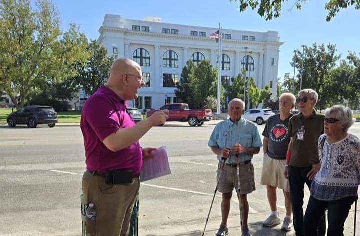 Barton County Historical Society Executive Director guides residents on a Historic Downtown Walking Tour in Great Bend. (photo from Historical Society)