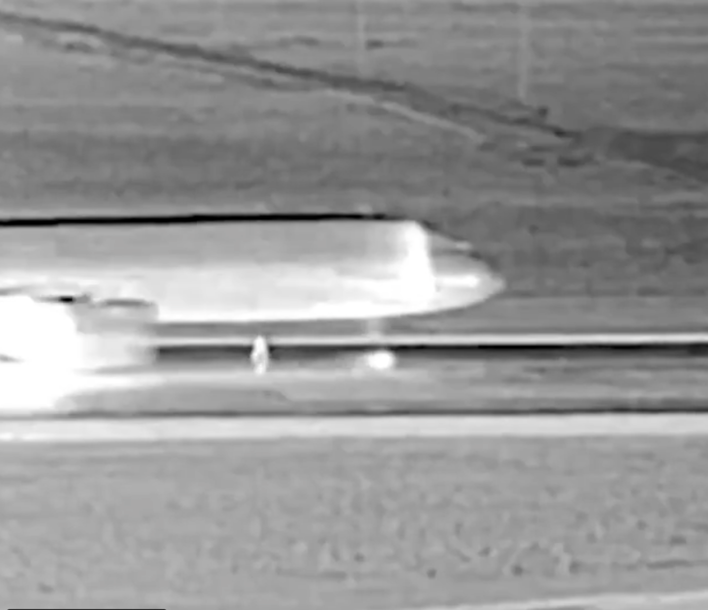 Thermal image just before the trespasser was struck by the plane and shown in Denver Department of Aviation video